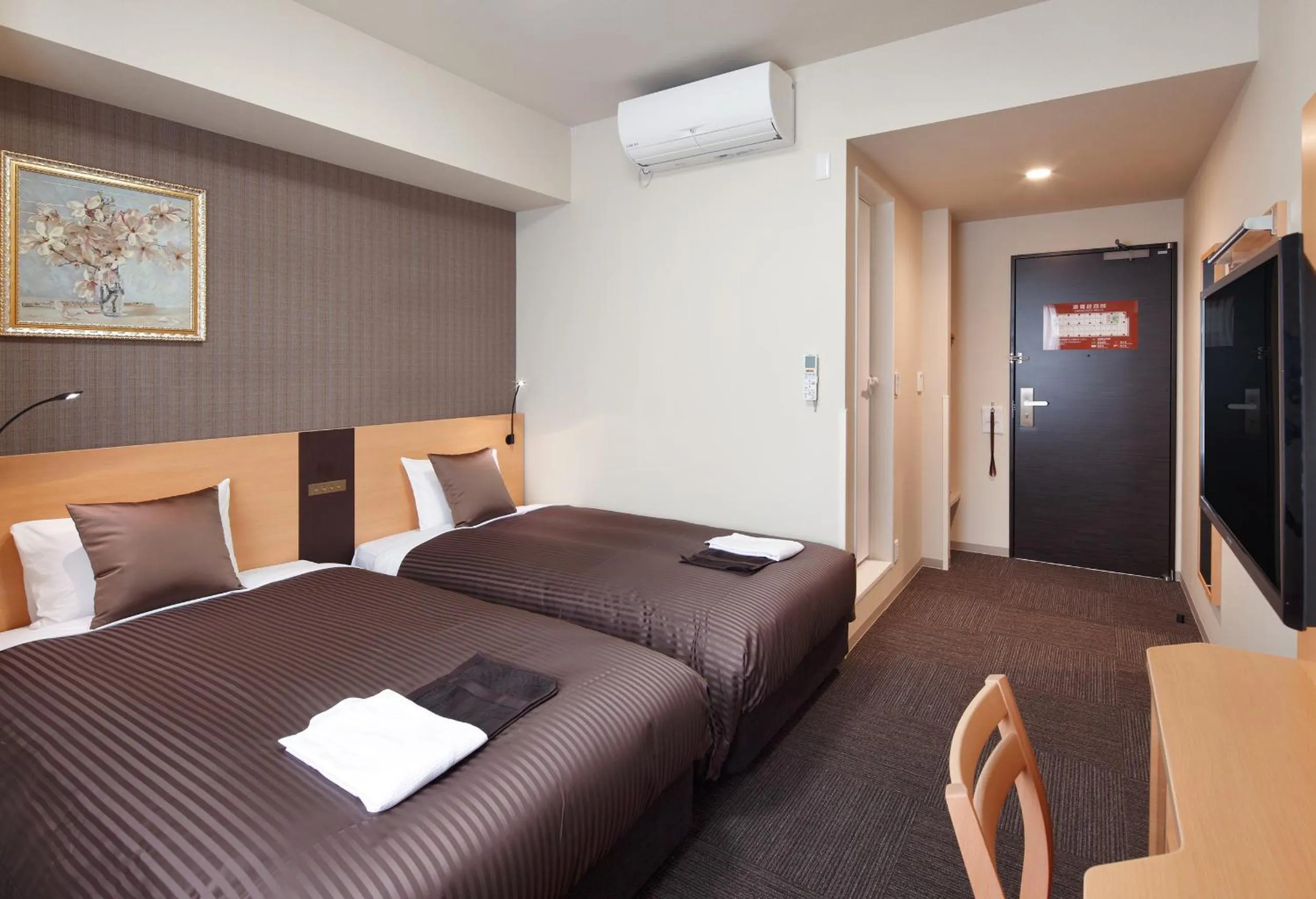 Bed in Hotel Super Tomari