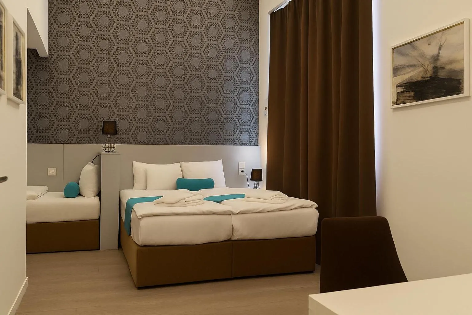 Bed in Hotel Mika Downtown