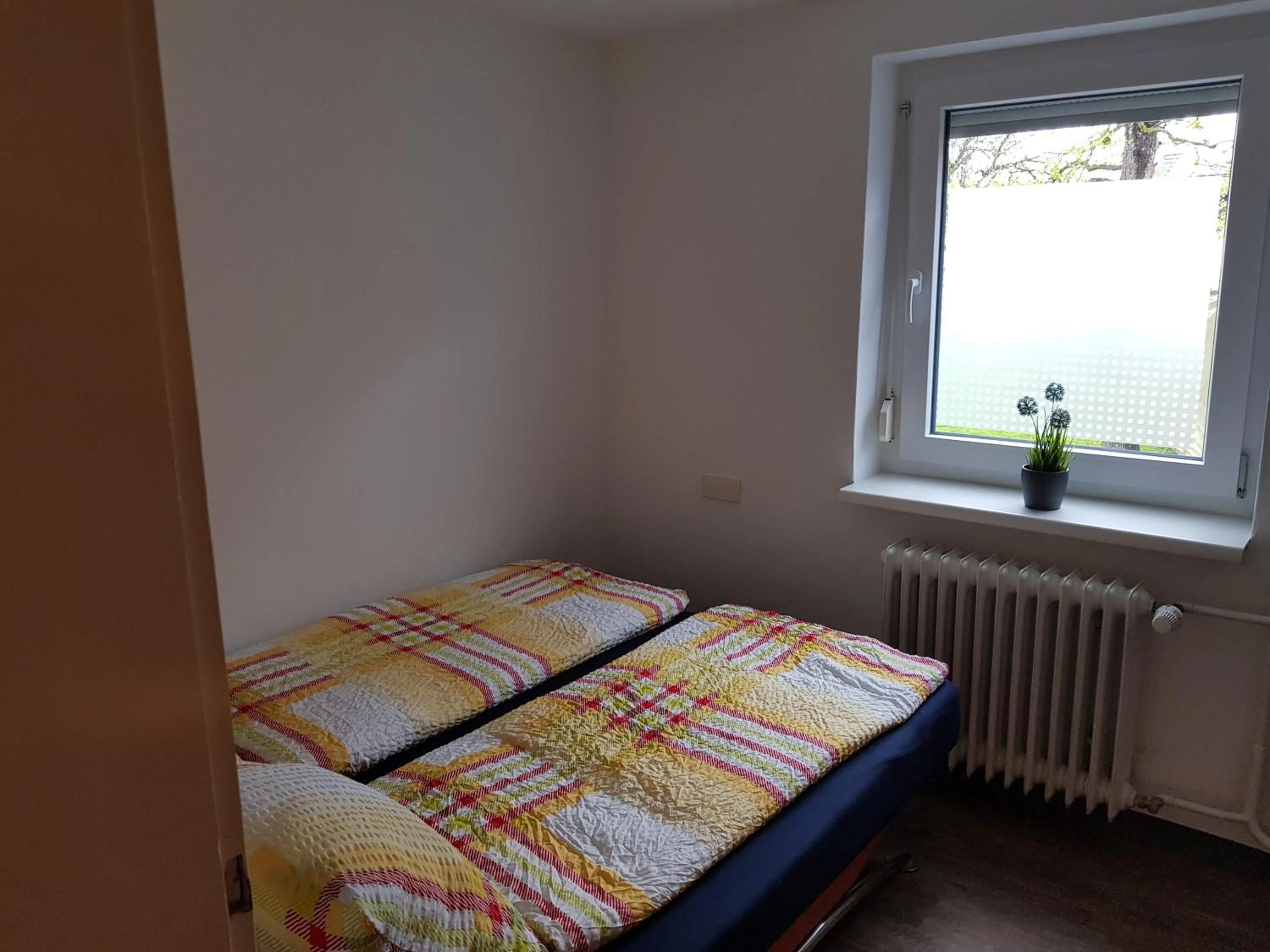 Bed in Ferienwohnung Eliah