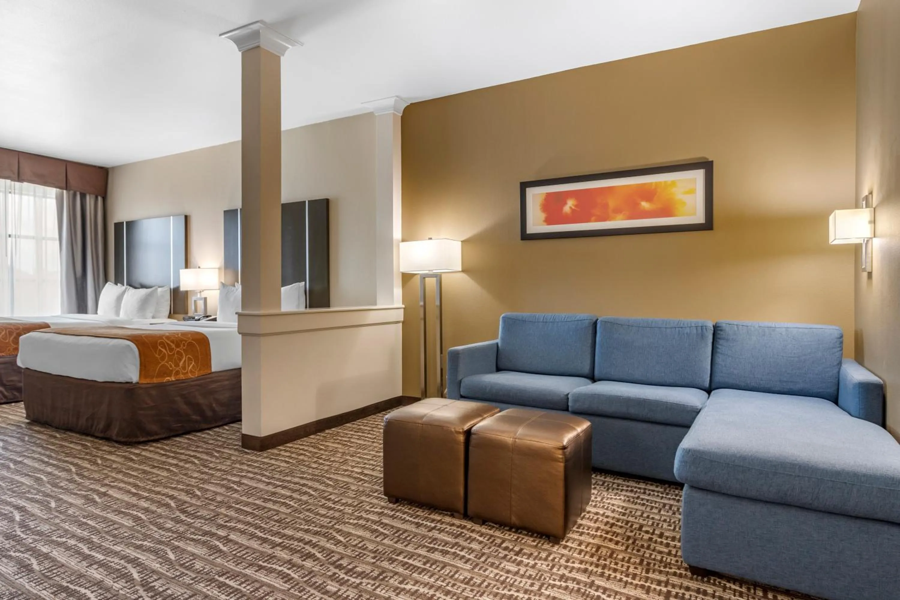 Seating area, Bed in Comfort Suites Near Sam Houston Race Park