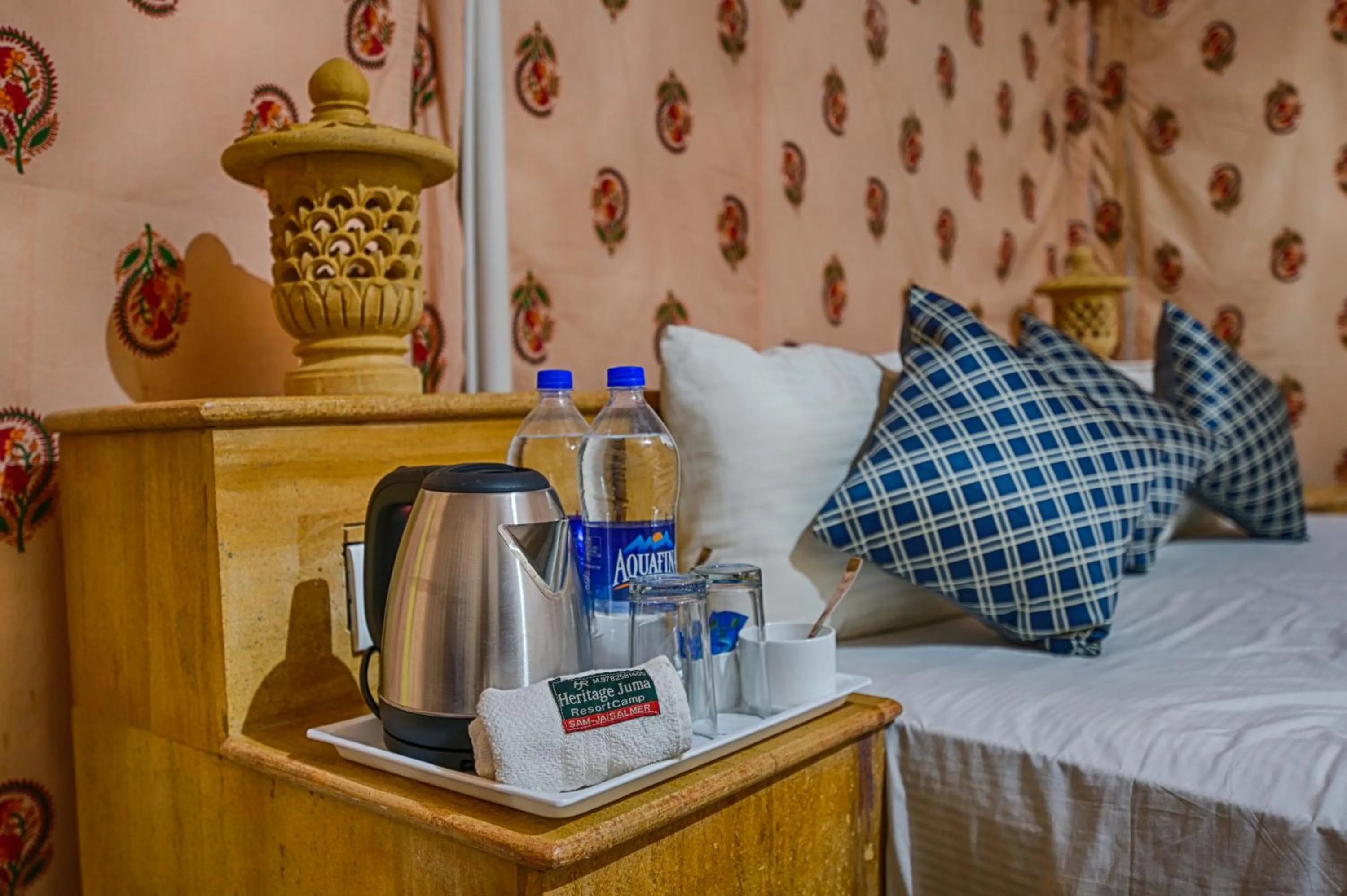 Bed in Heritage Juma Resort with swimming pool