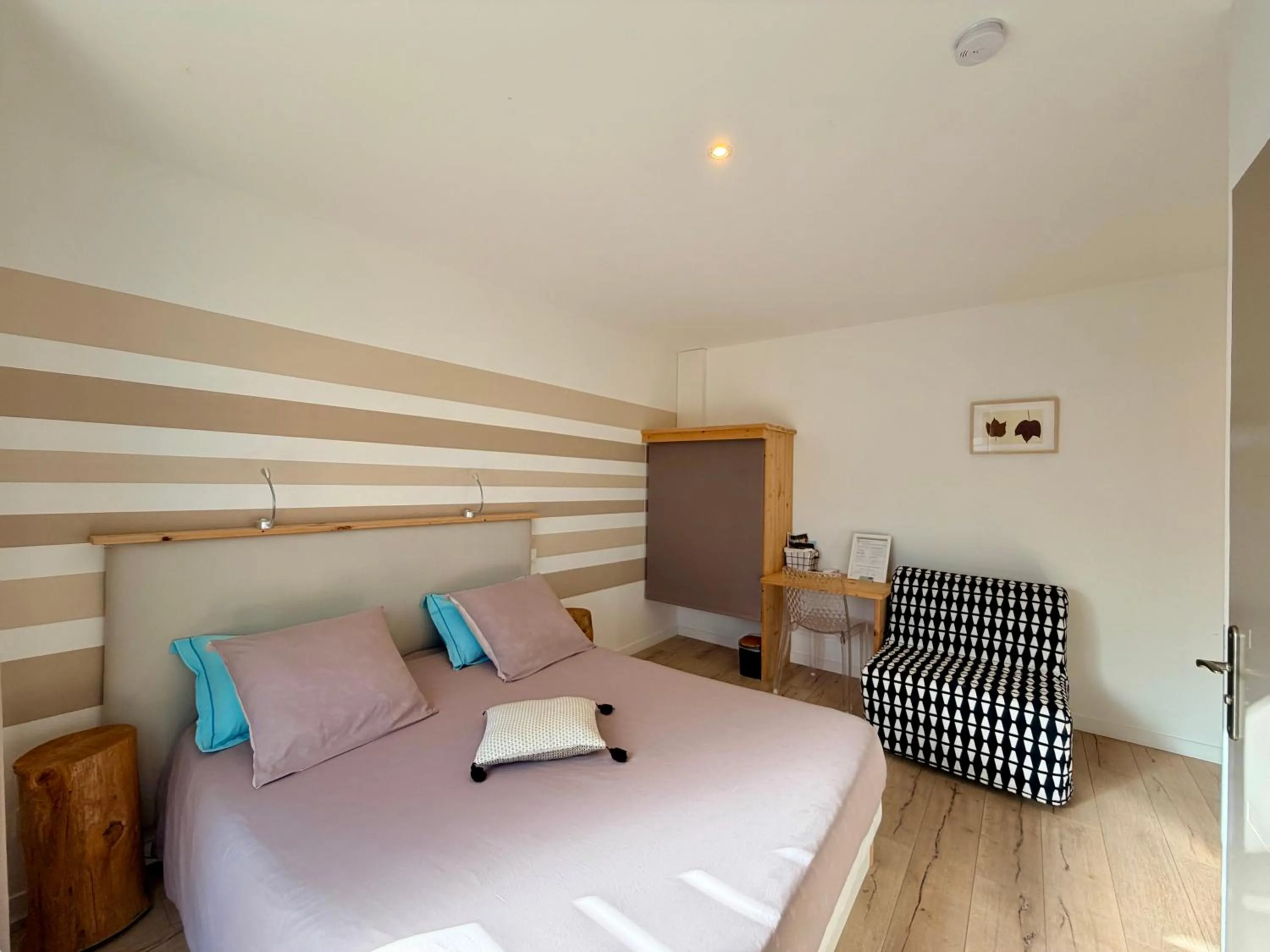 Bed in CARPE DIEM Résidence Hôtelière