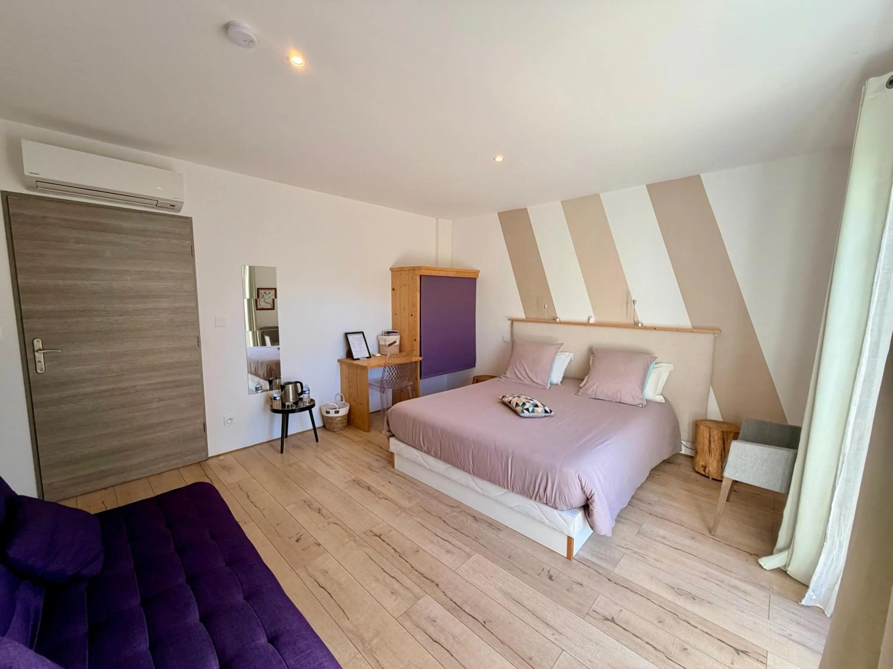 Bed in CARPE DIEM Résidence Hôtelière