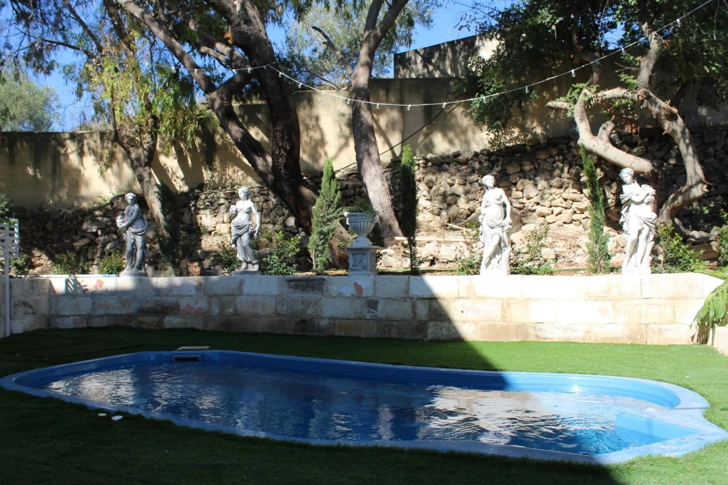 Swimming pool in The Red Farm Relais & Spa