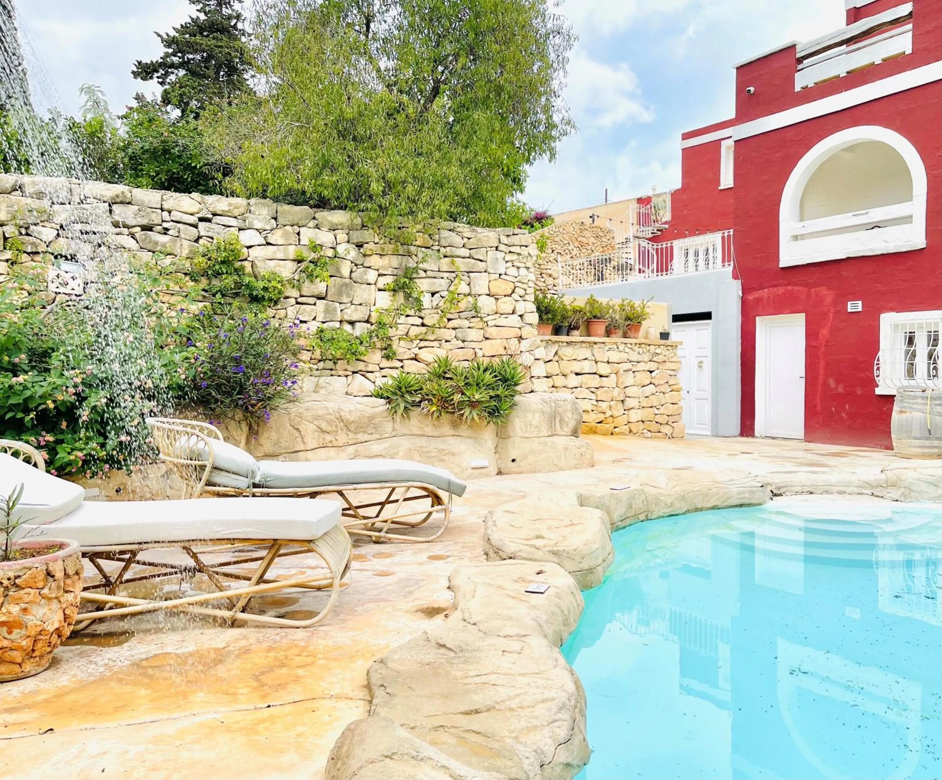 Swimming pool in The Red Farm Relais & Spa