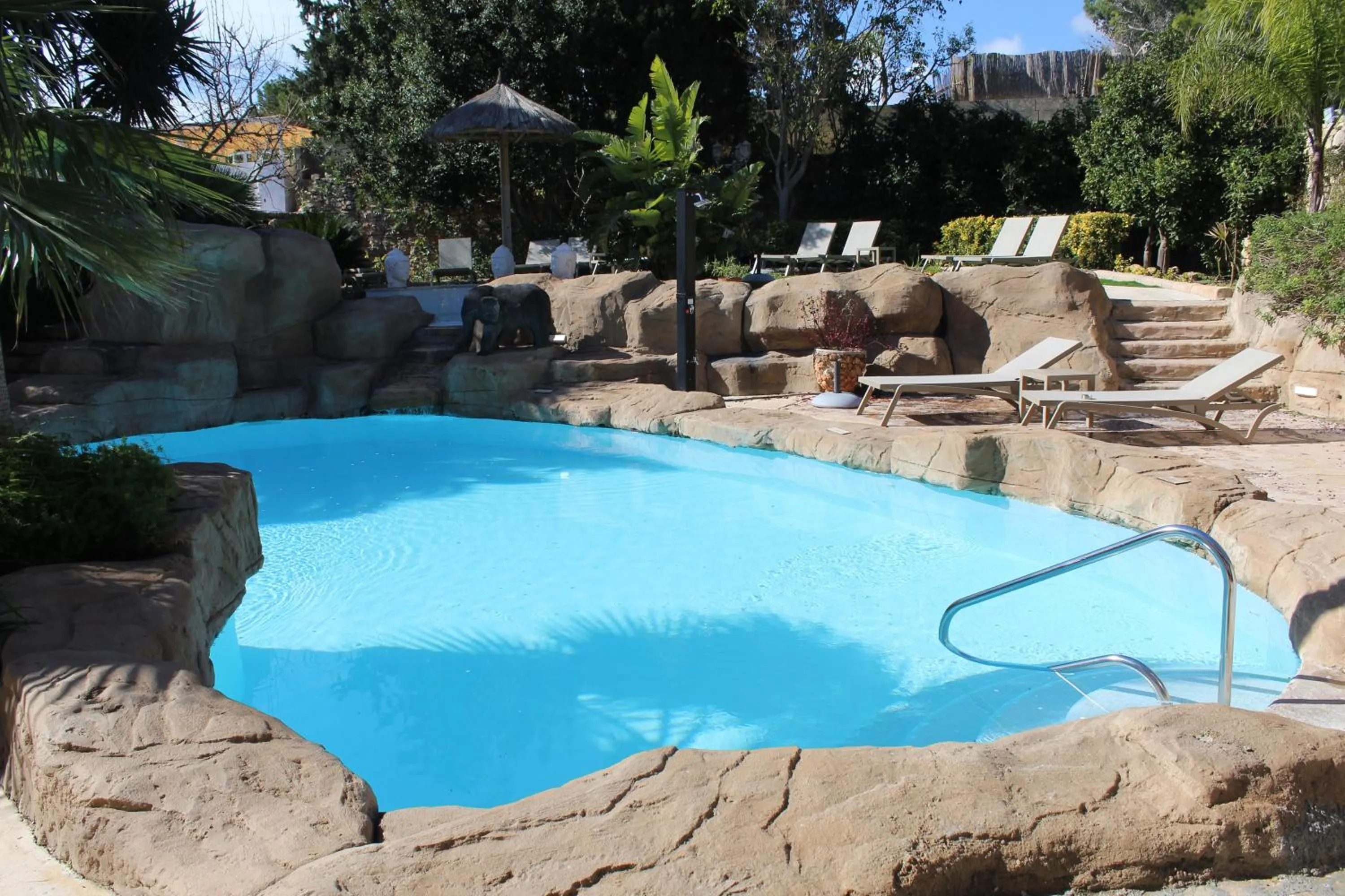 Swimming pool in The Red Farm Relais & Spa