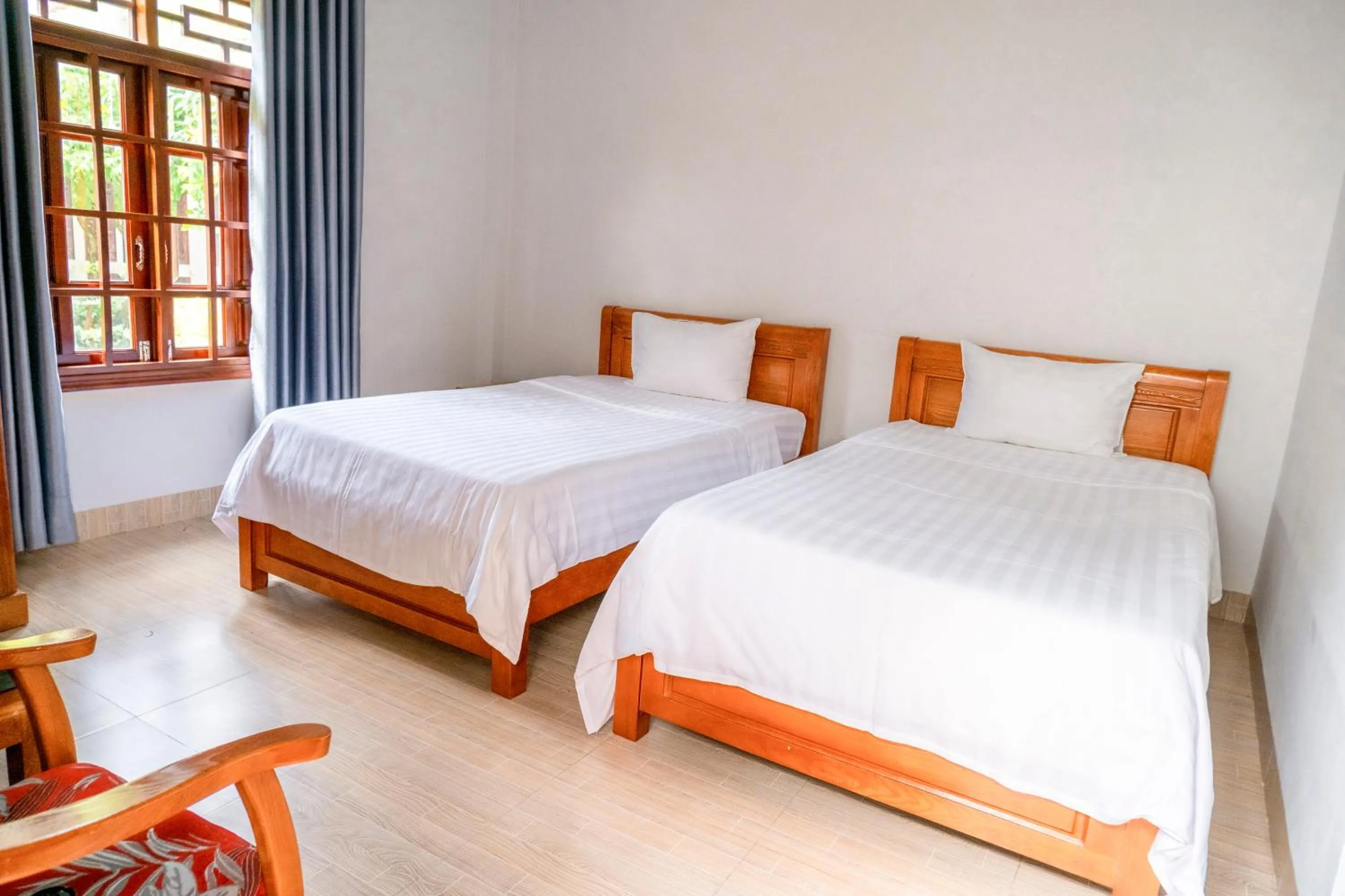 Photo of the whole room, Bed in Wings Bungalow