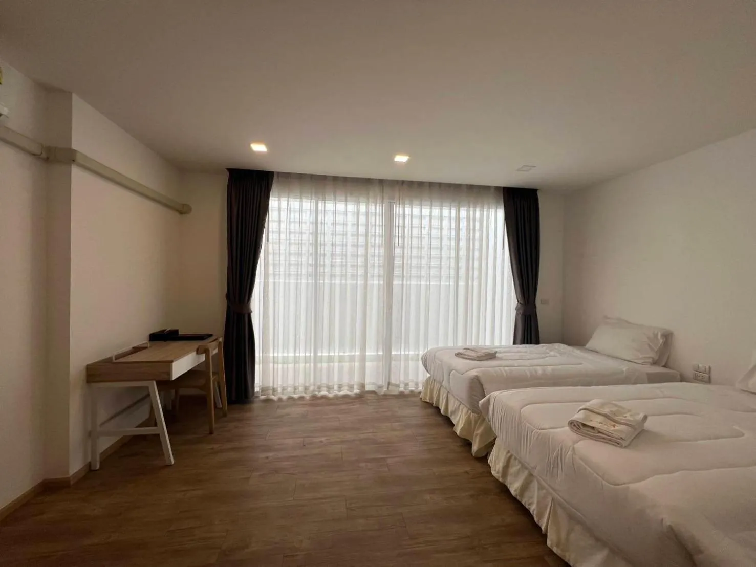 Bed in Karin hotel & Service apartment - SHA Extra Plus