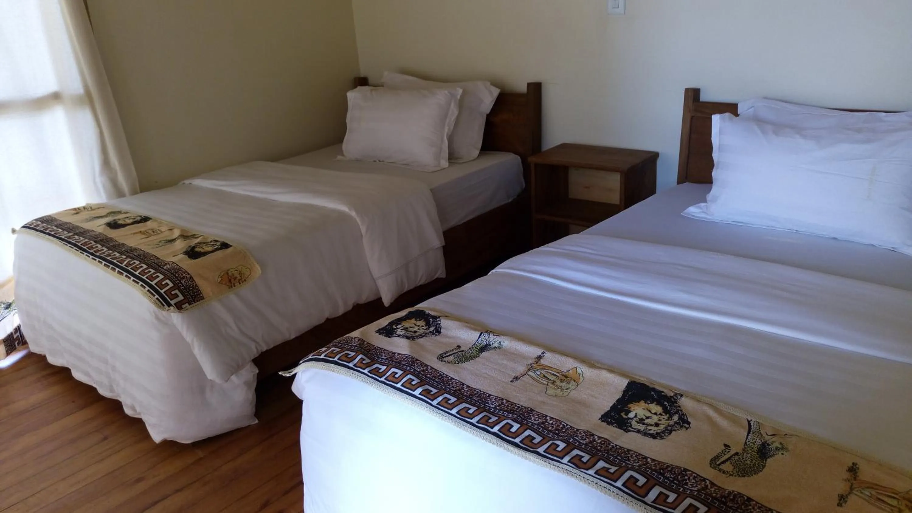 Bed in Ichumbi Gorilla Lodge