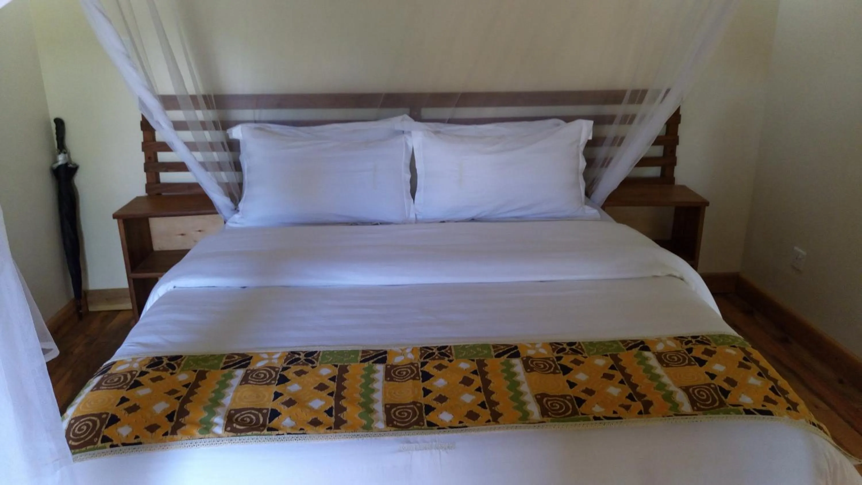 Bed in Ichumbi Gorilla Lodge
