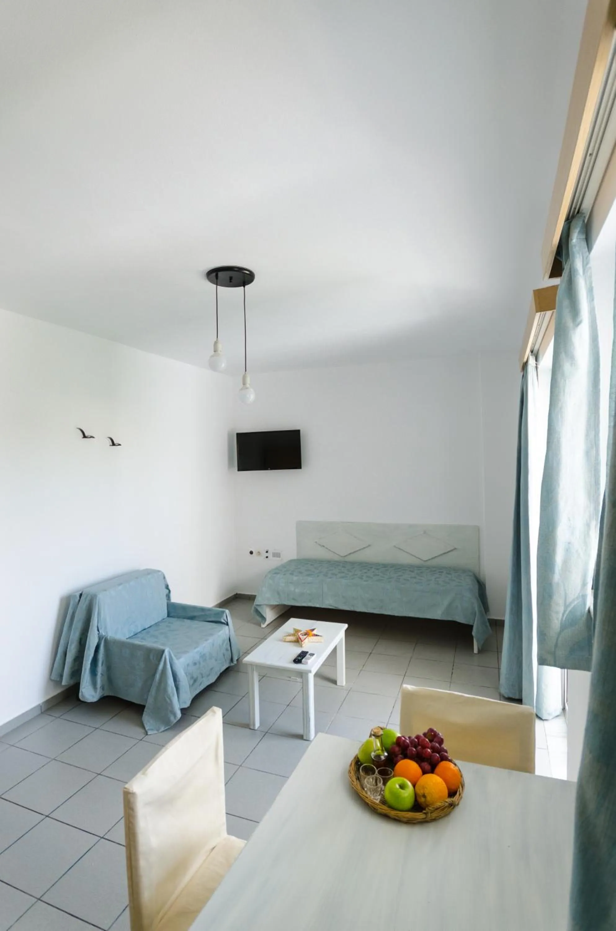 Bed in Happiness Apartments