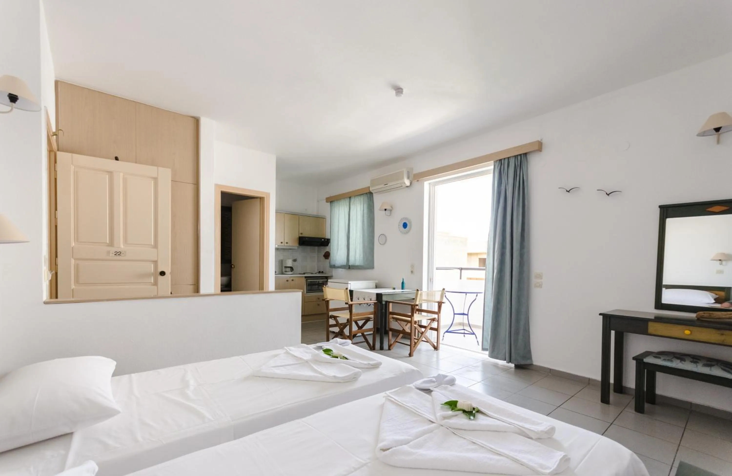 Bed in Happiness Apartments