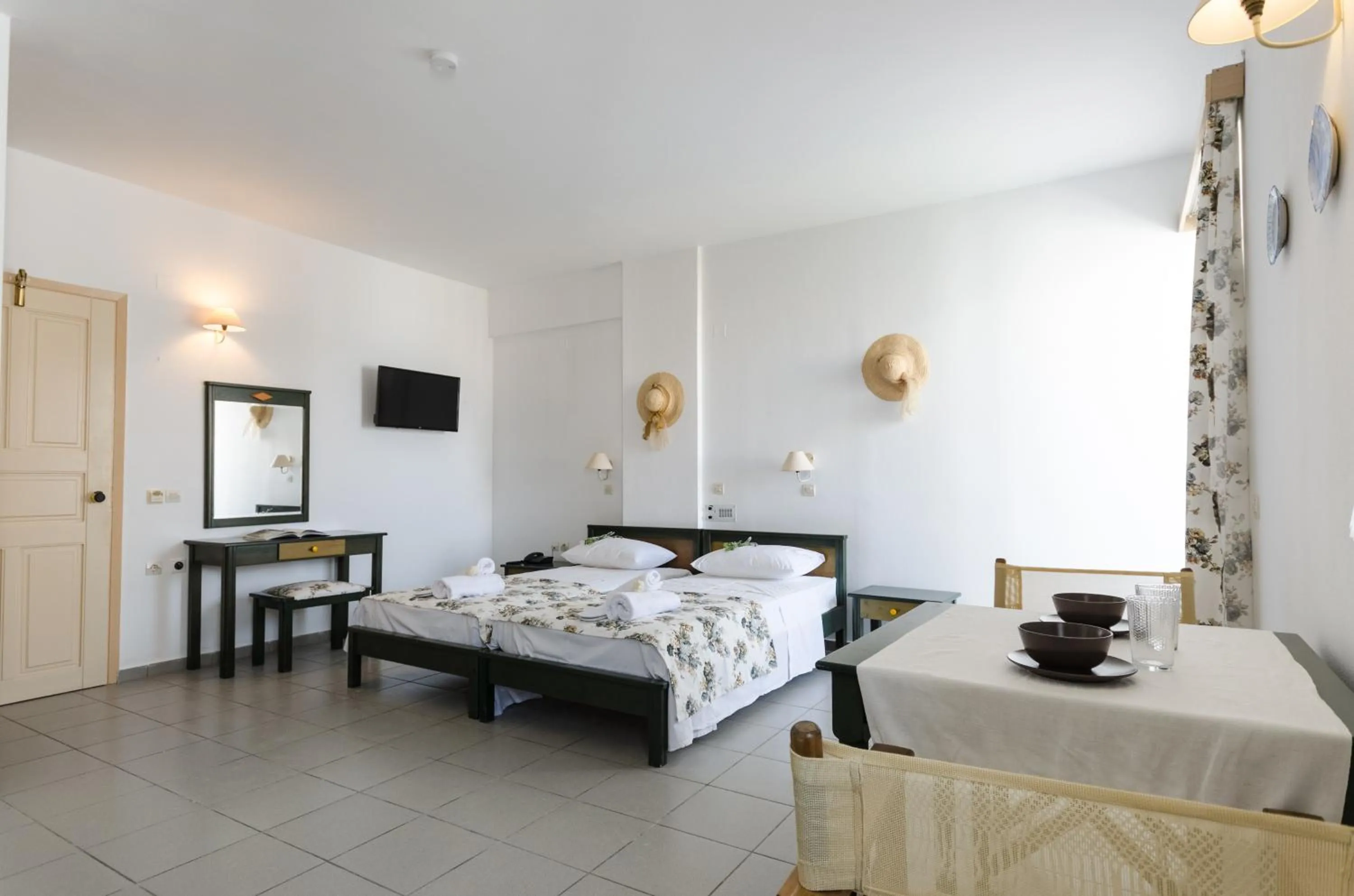 Bed in Happiness Apartments