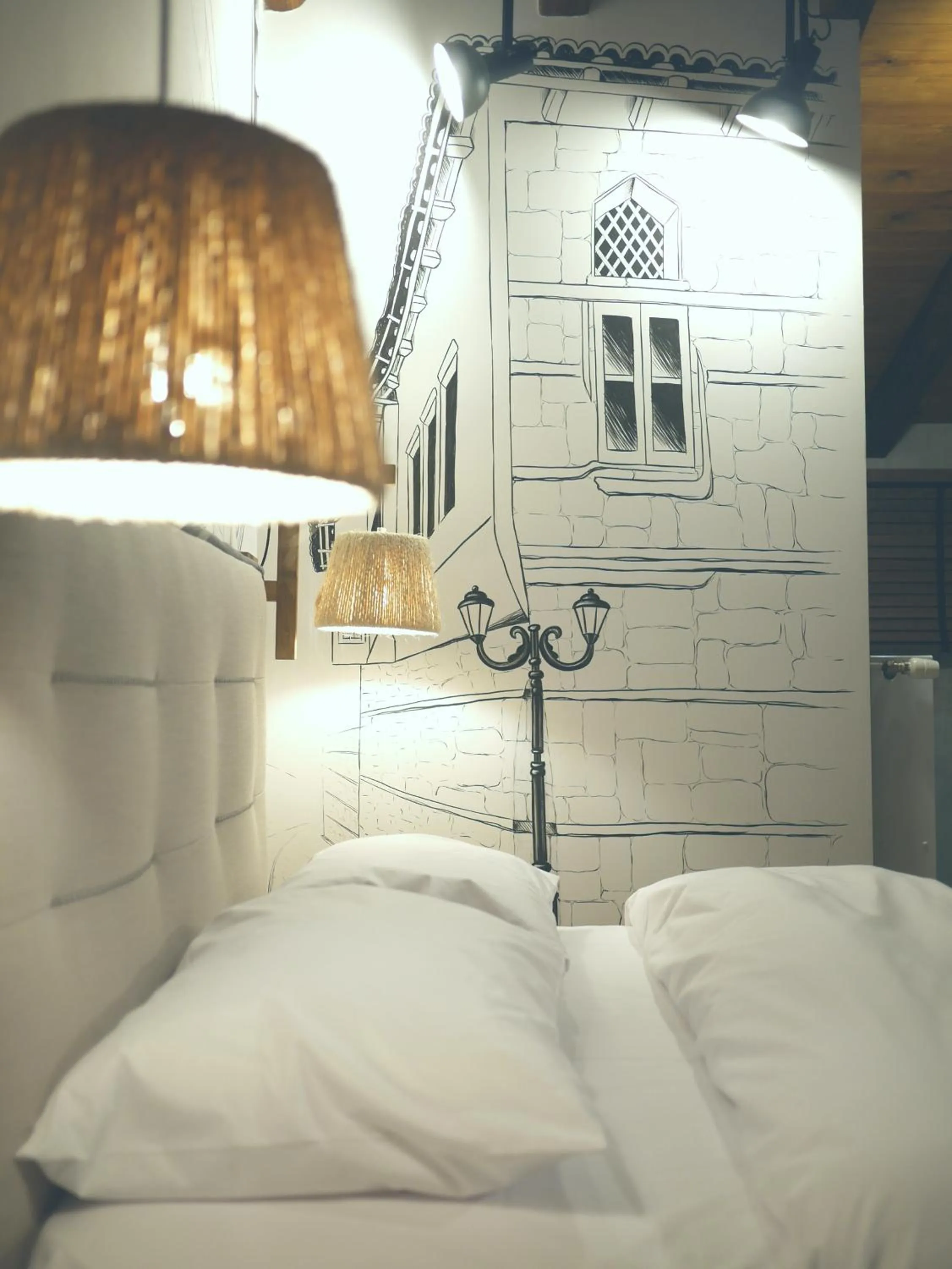 Decorative detail, Bed in Olganos VL Luxury Rooms & Suites