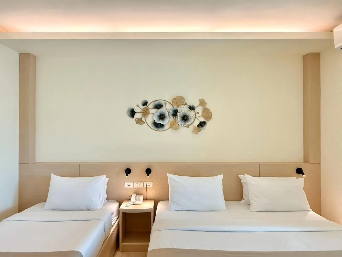 Bed in Loei Village Hotel