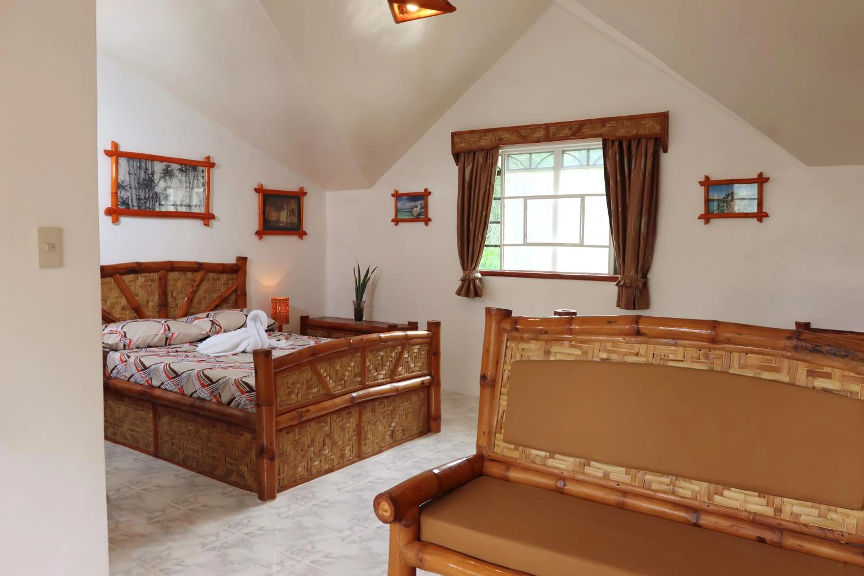 Bedroom in Guindulman Bay Tourist Inn