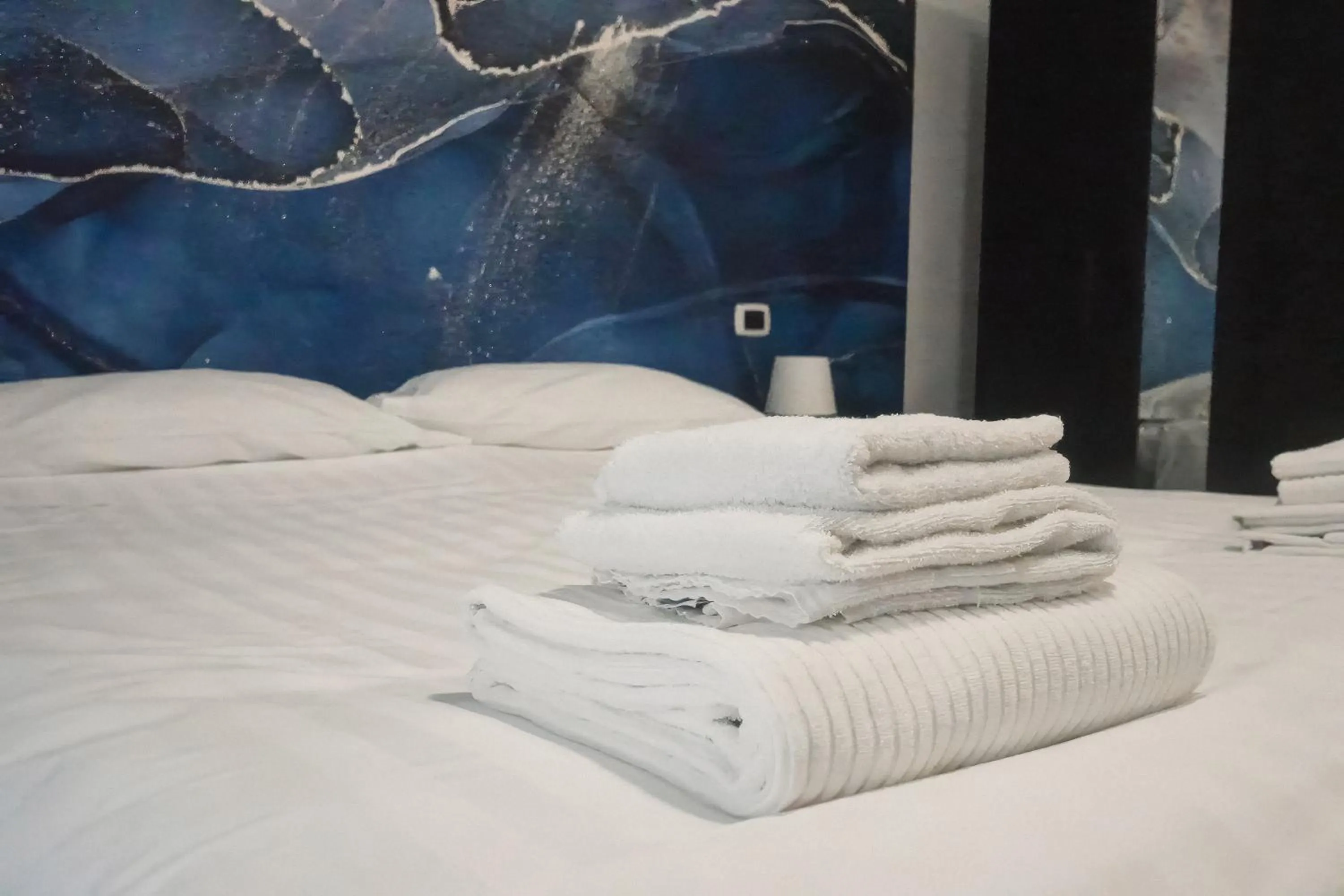 Bed in La Boheme SMART Hotel