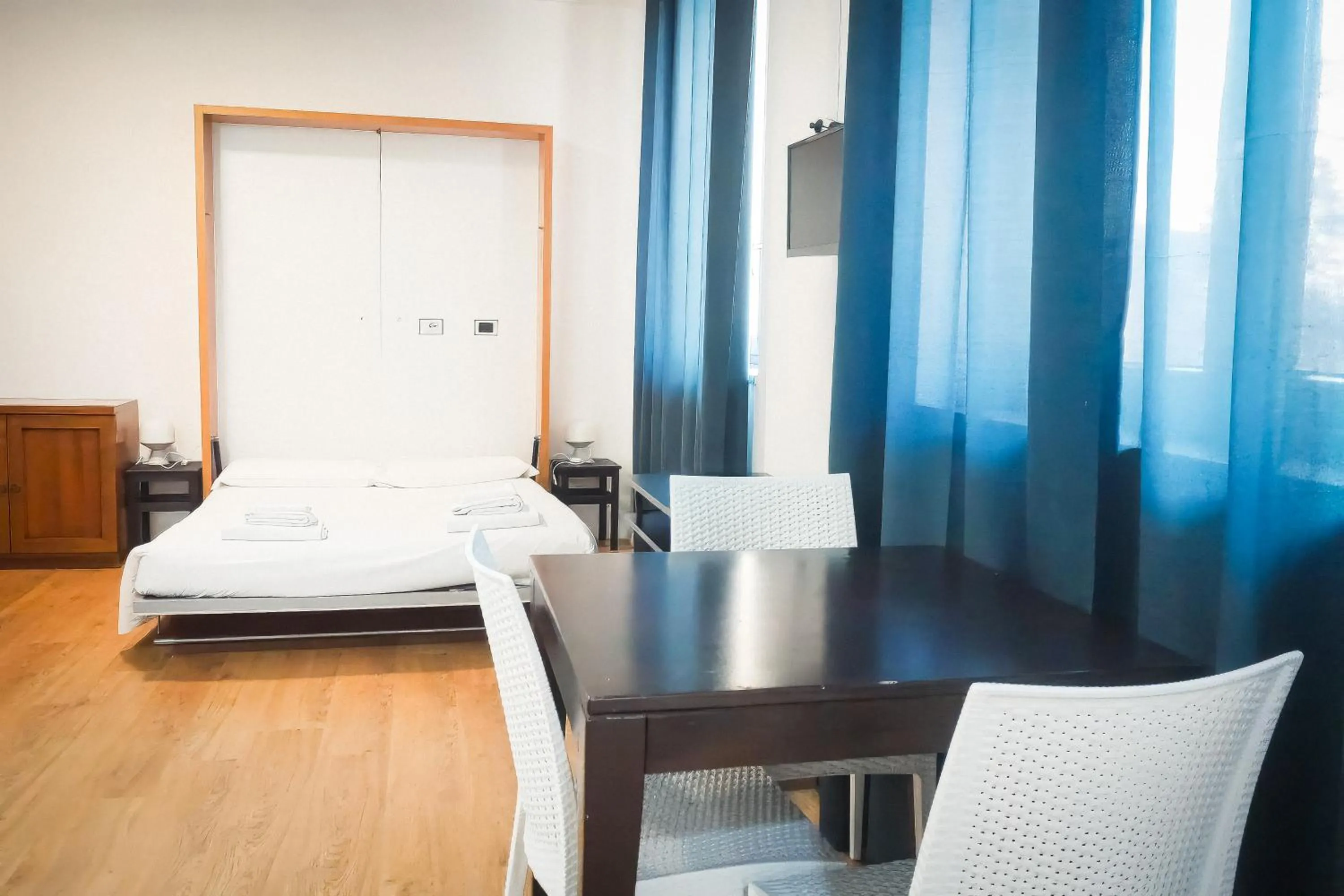 Bed in La Boheme SMART Hotel