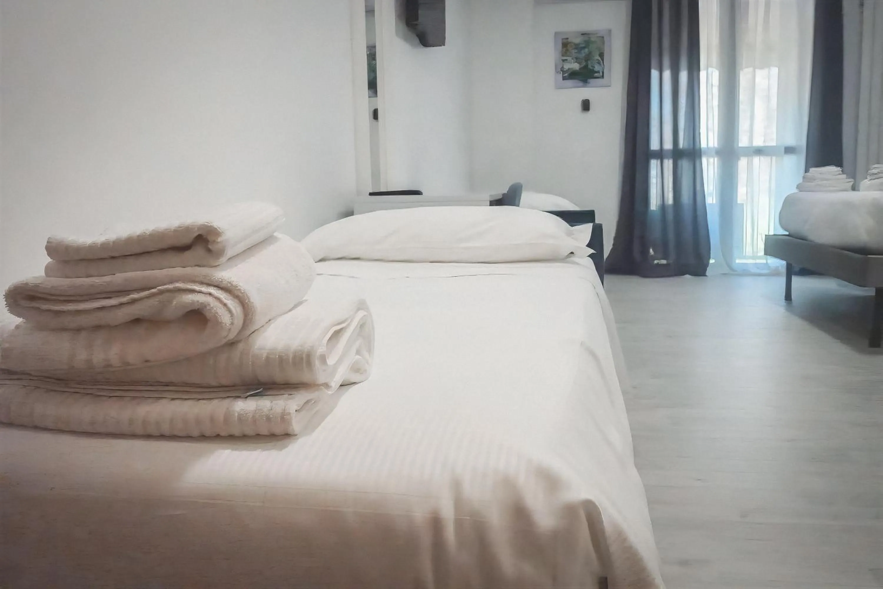 Bed in La Boheme SMART Hotel