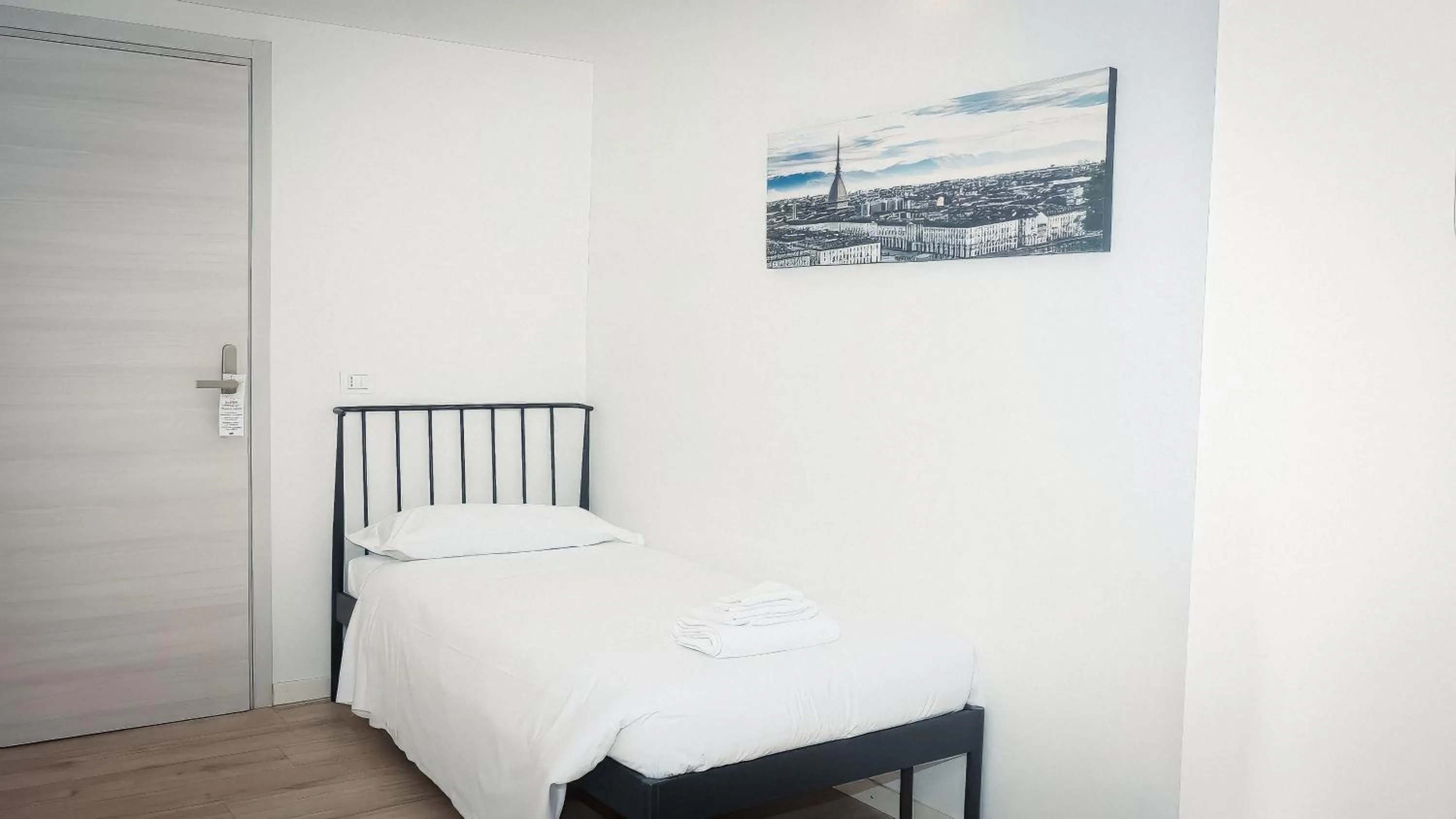 Bed in La Boheme SMART Hotel