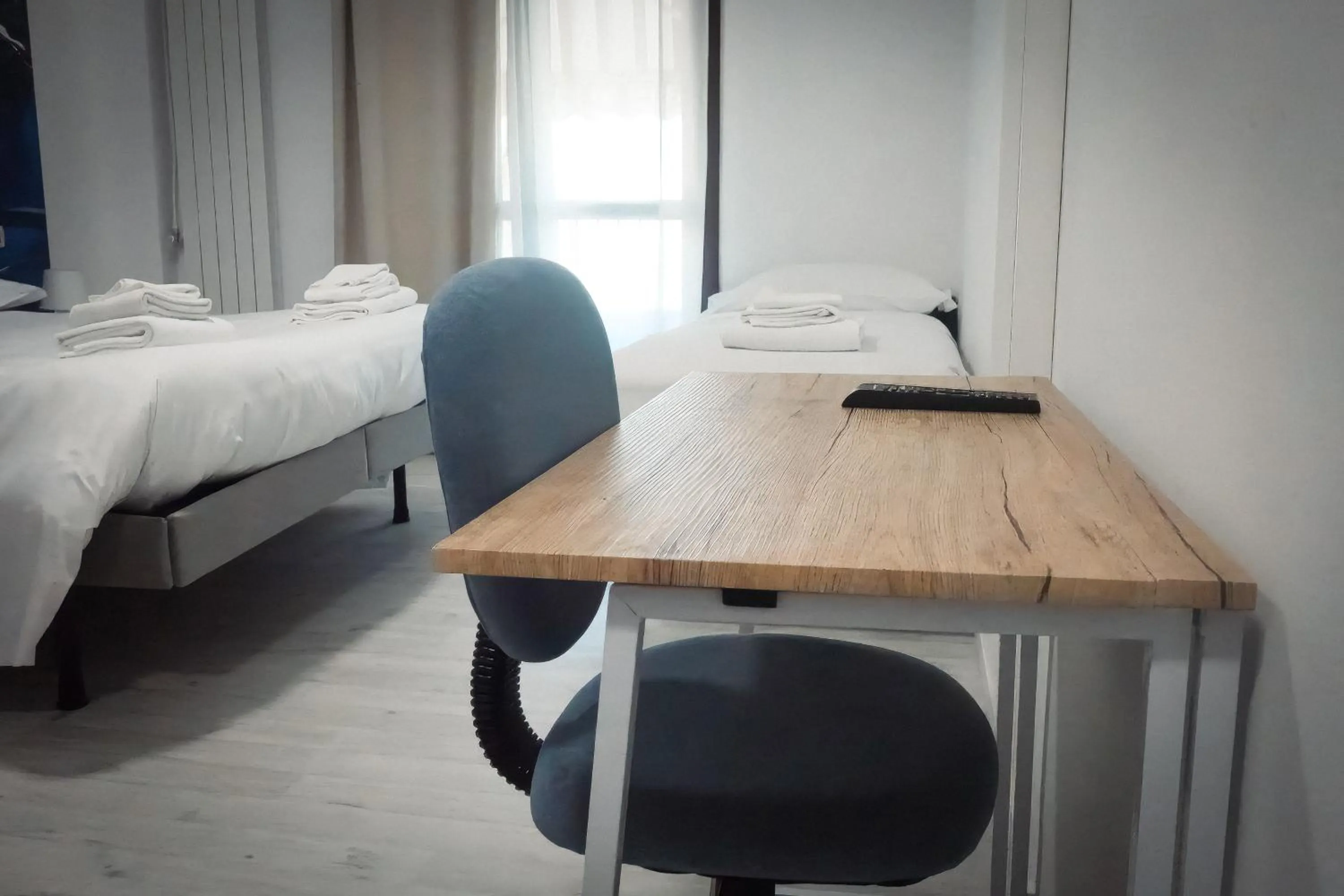 Bed in La Boheme SMART Hotel