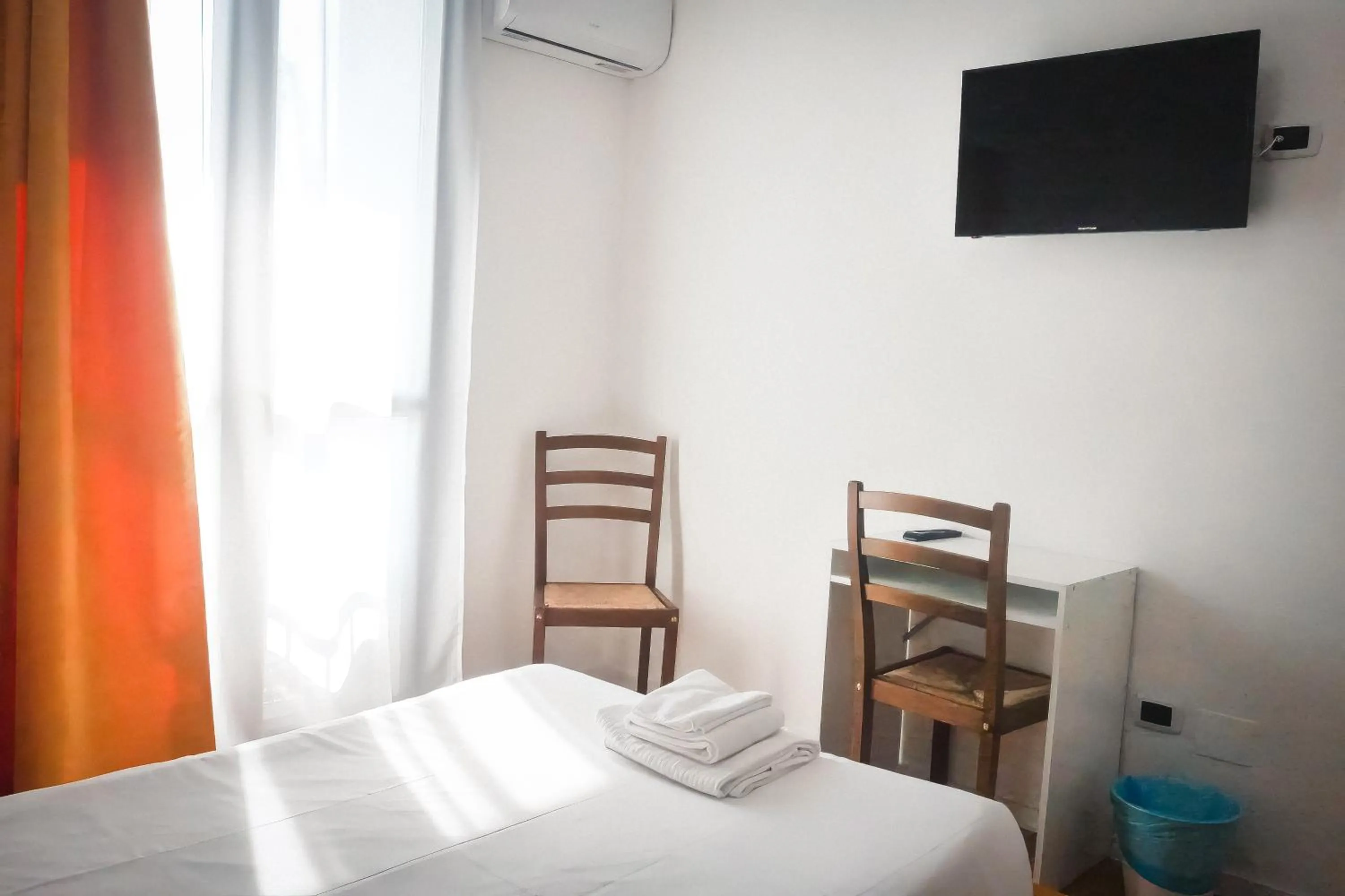 Bed in La Boheme SMART Hotel