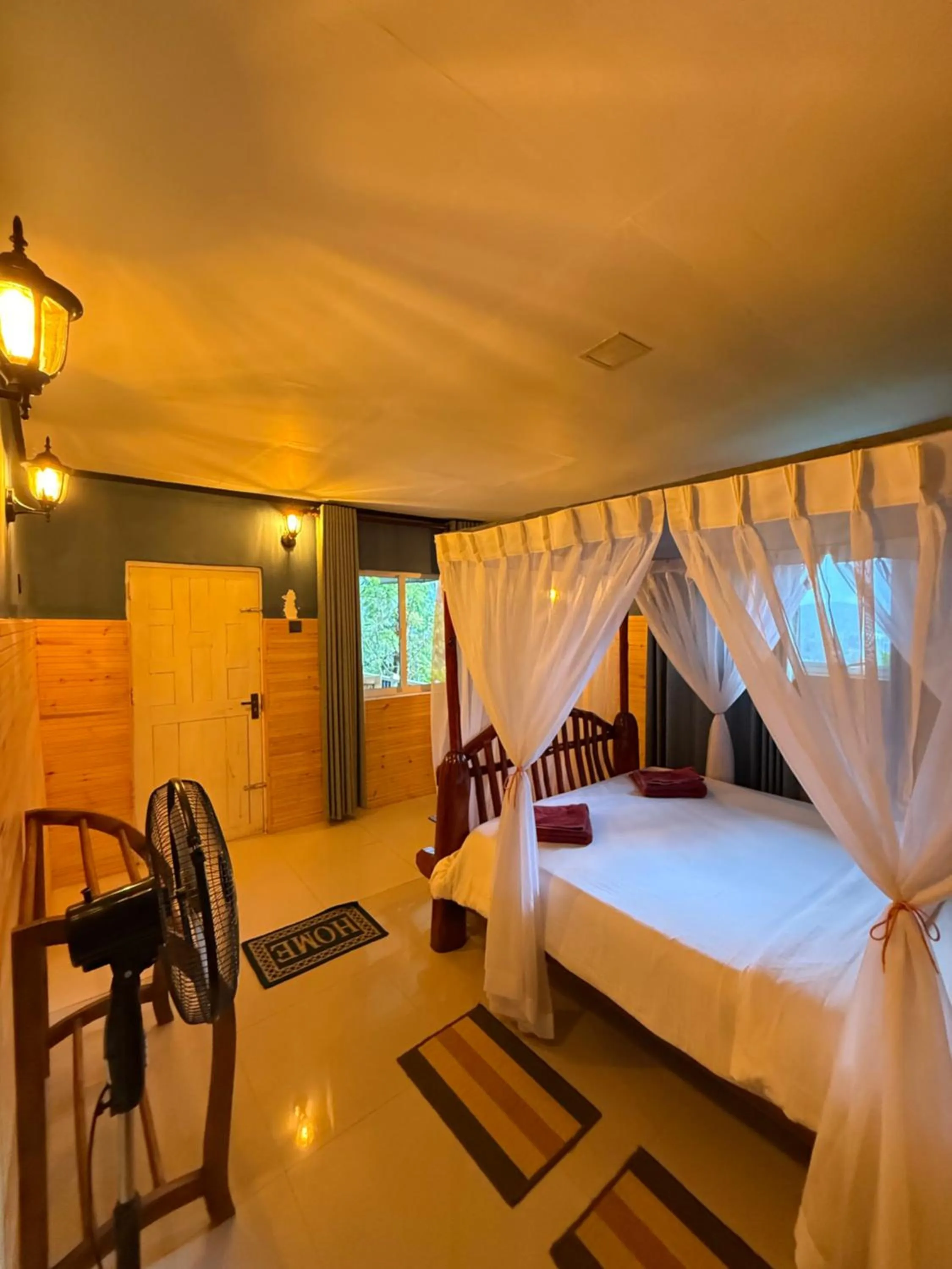 Living room, Bed in Guest Inn Avendra