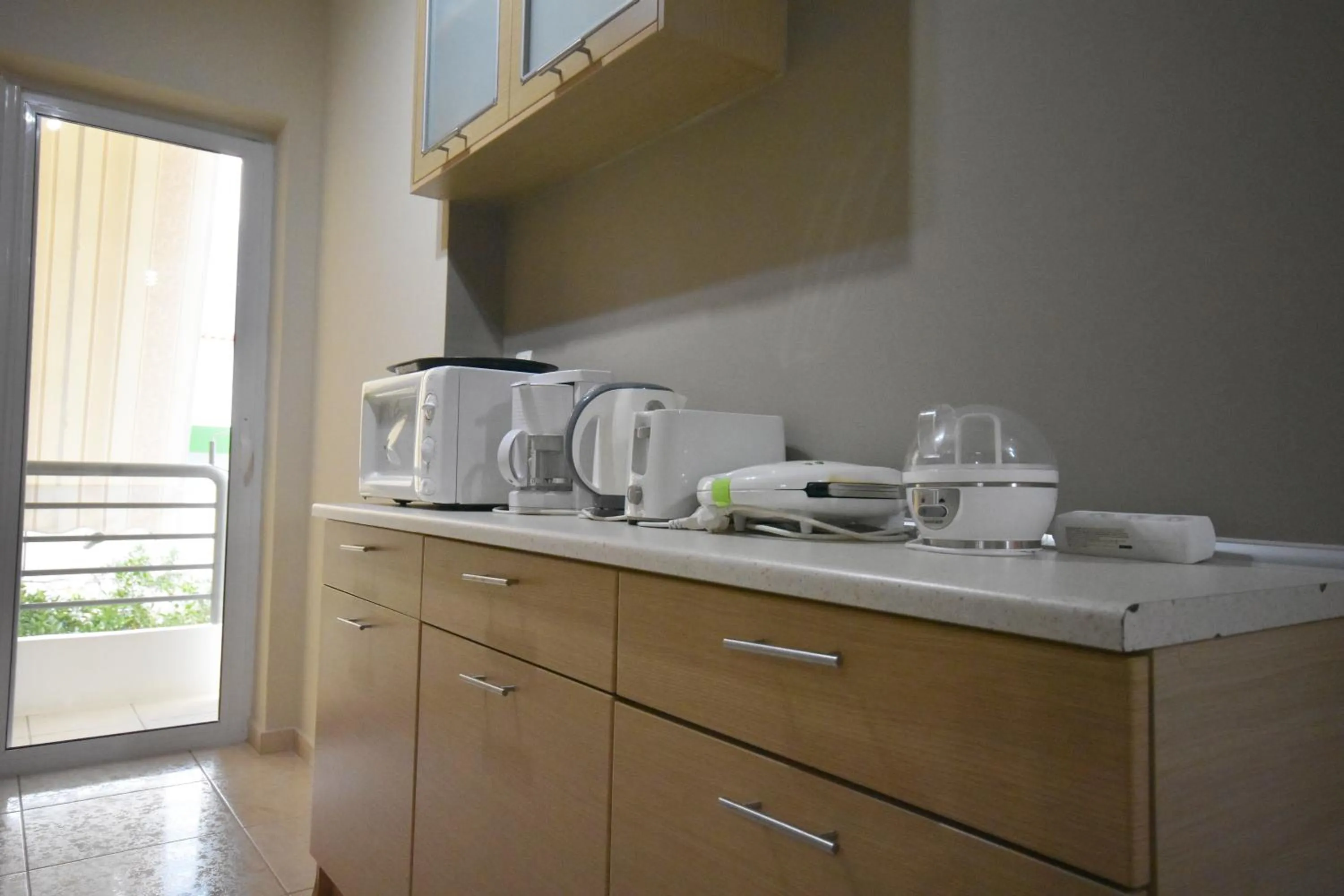 Kitchen or kitchenette in A&J Apartments or Rooms athens airport