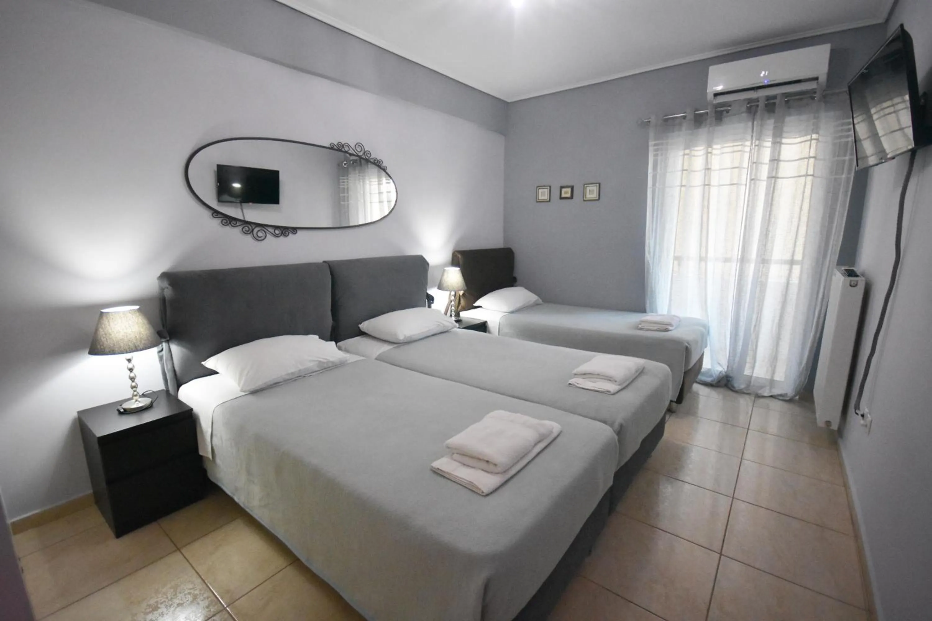 Bedroom, Bed in A&J Apartments or Rooms athens airport