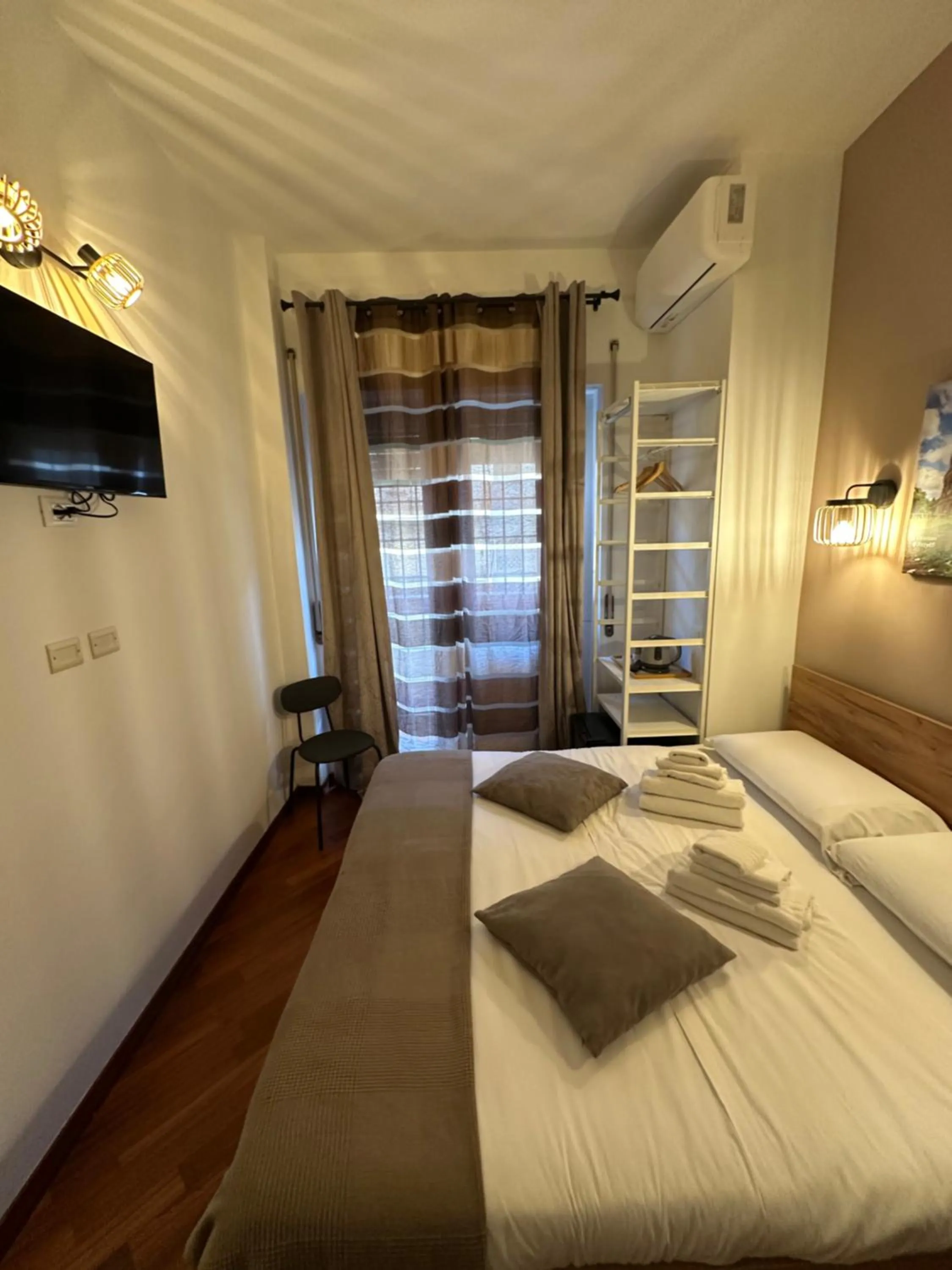 Bed in Vatican QG Rooms