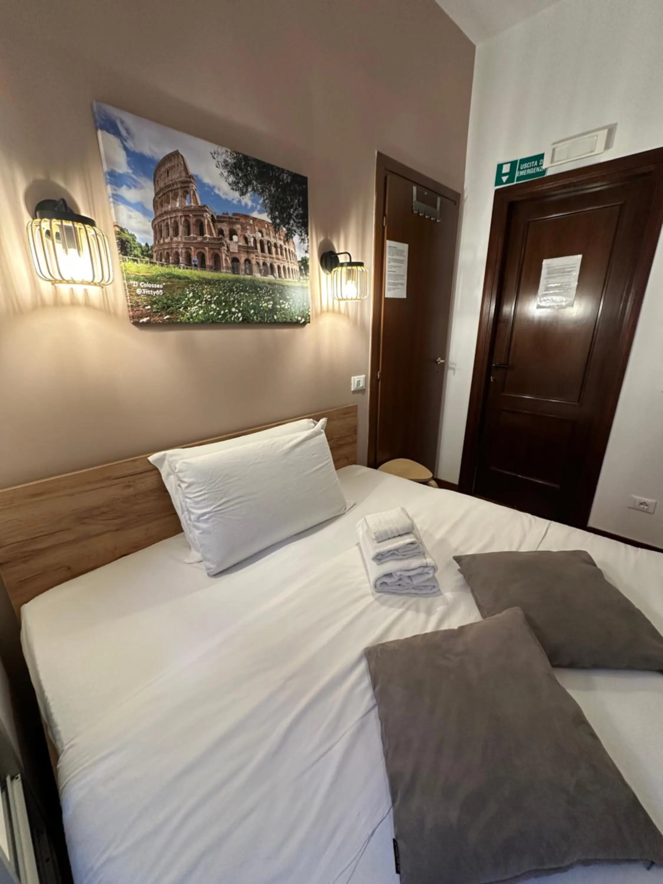 Bed in Vatican QG Rooms