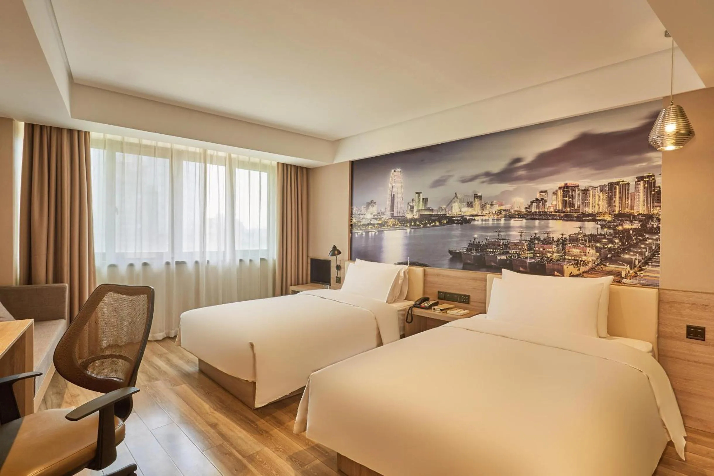 Bed in Ningbo Tianyi Square Atour Hotel