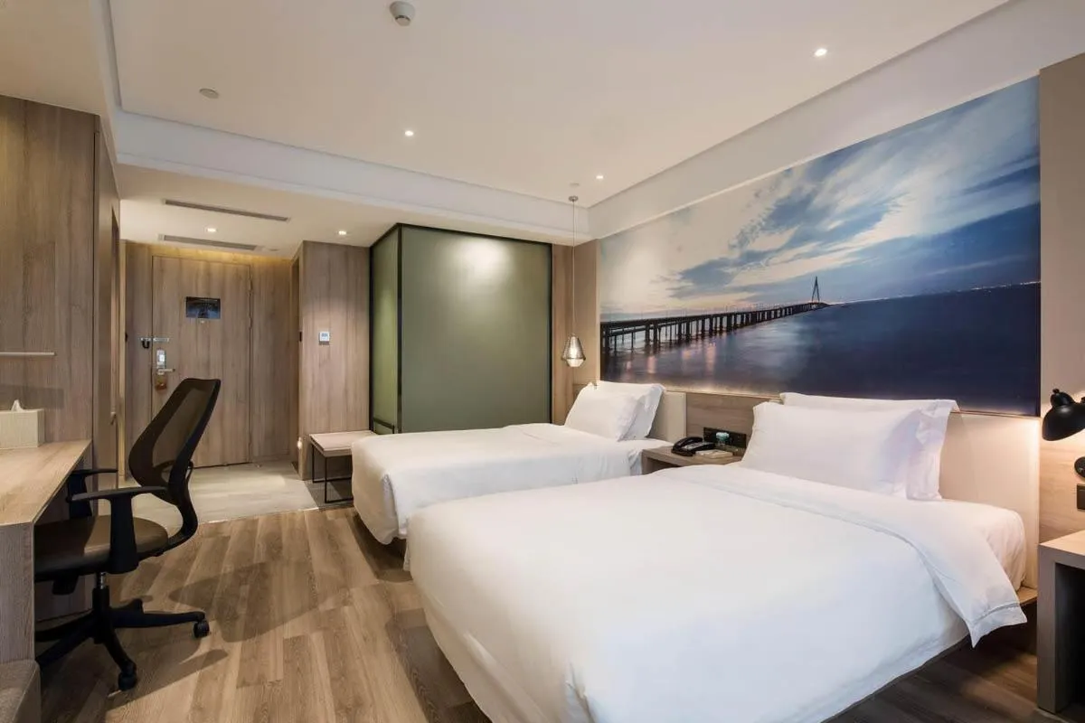 Bed in Ningbo Tianyi Square Atour Hotel