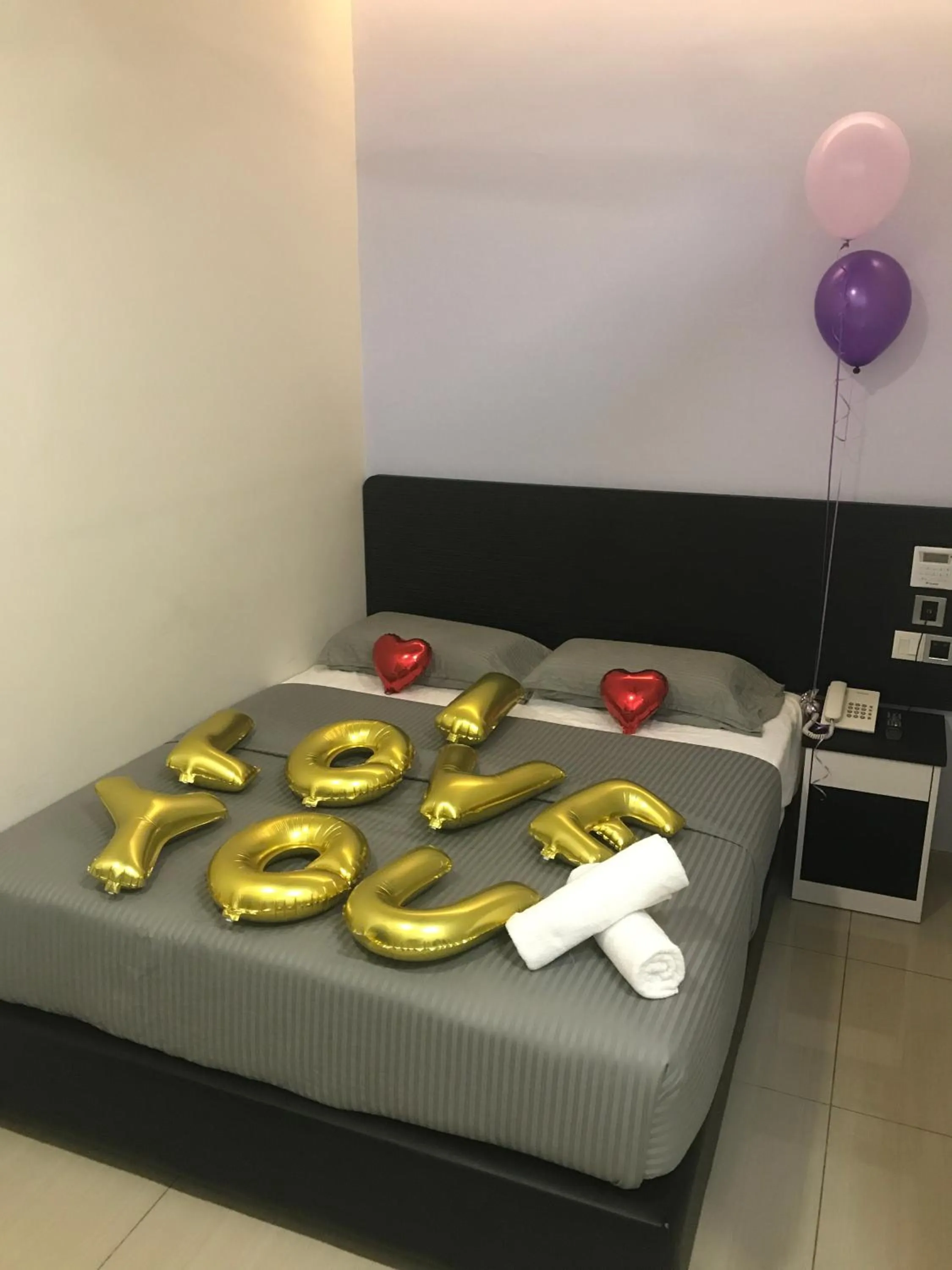 Decorative detail, Bed in Merrinton Hotel Temerloh