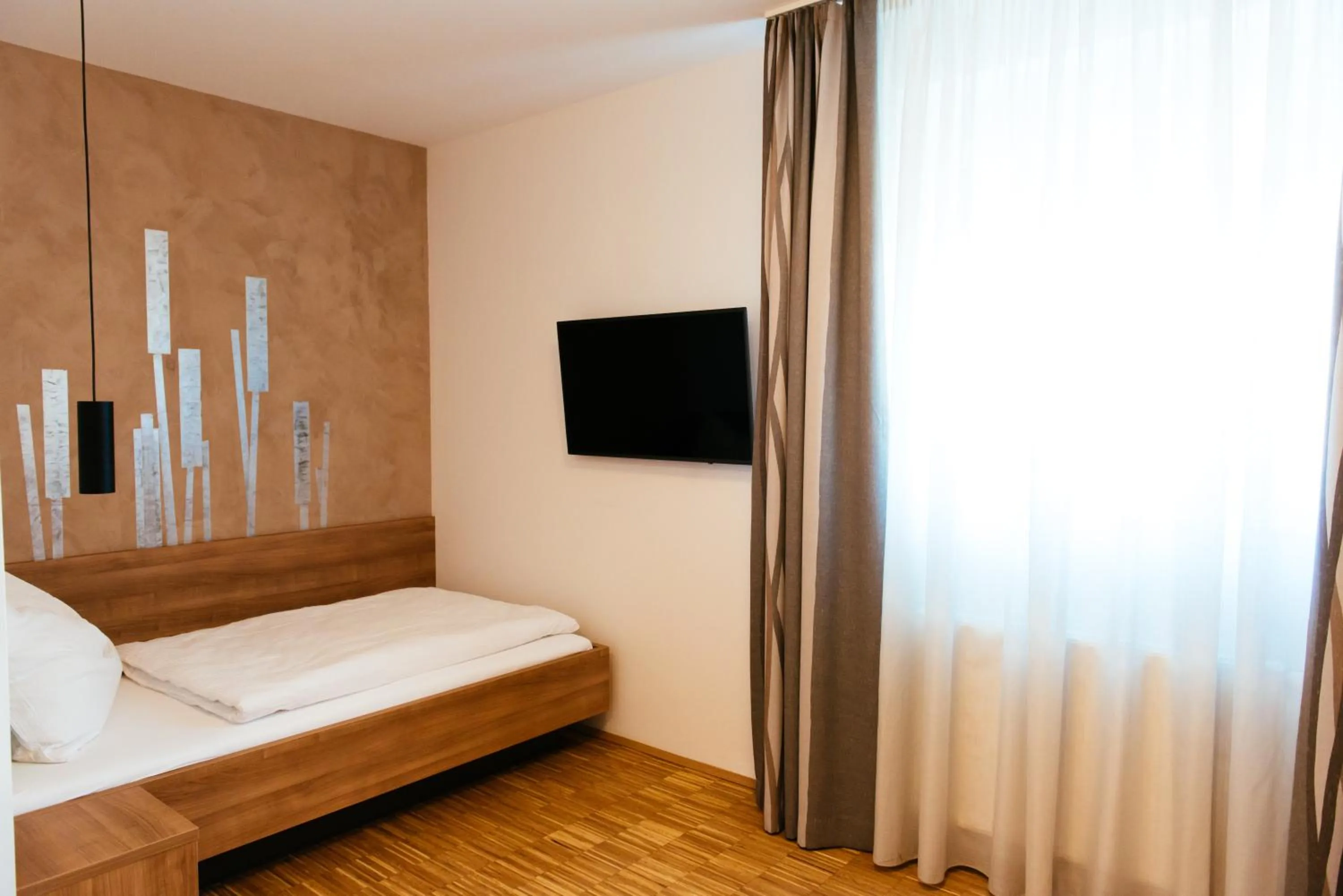 Photo of the whole room, Bed in Aparthotel Heuberger