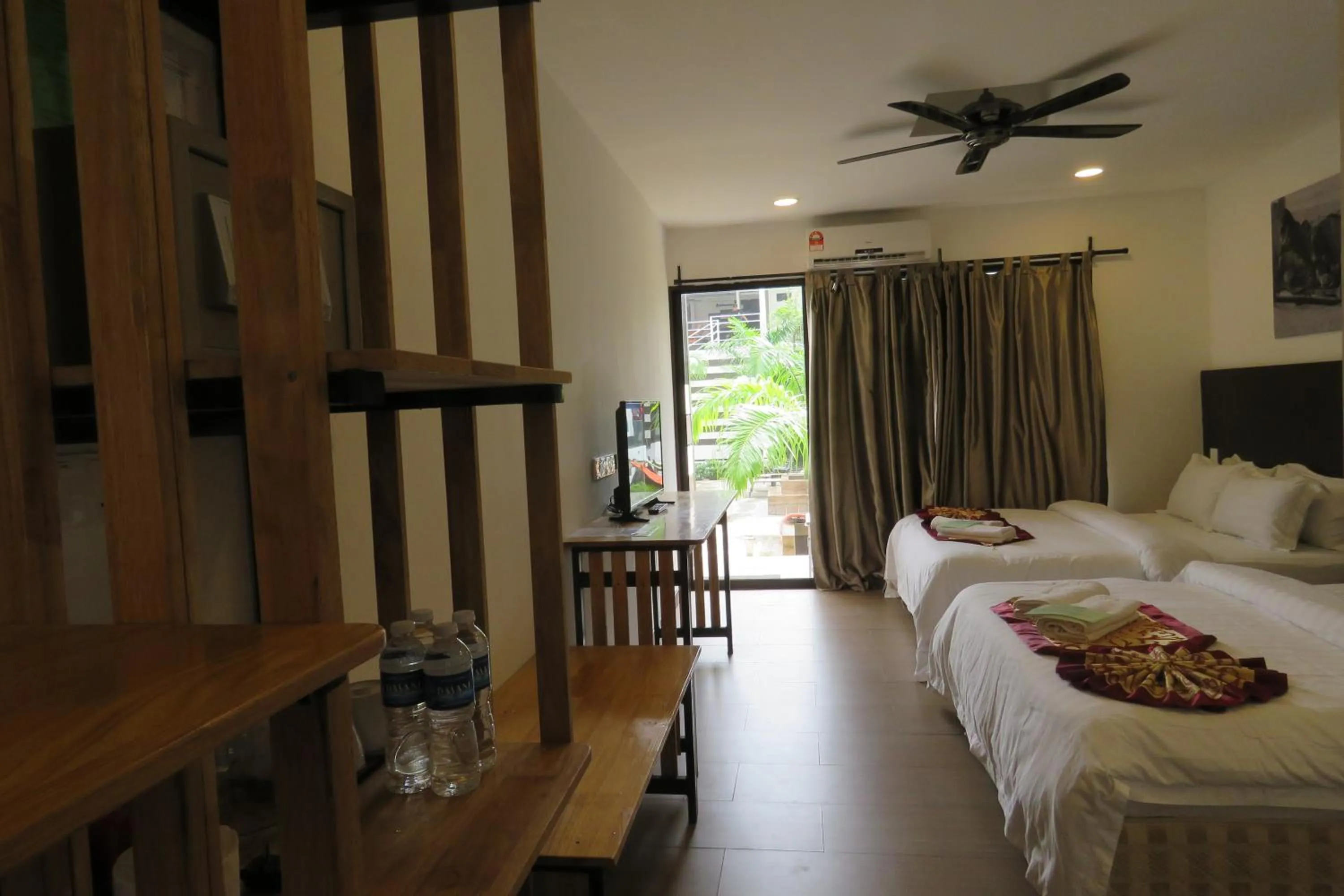 Bed in The Barat Tioman Beach Resort