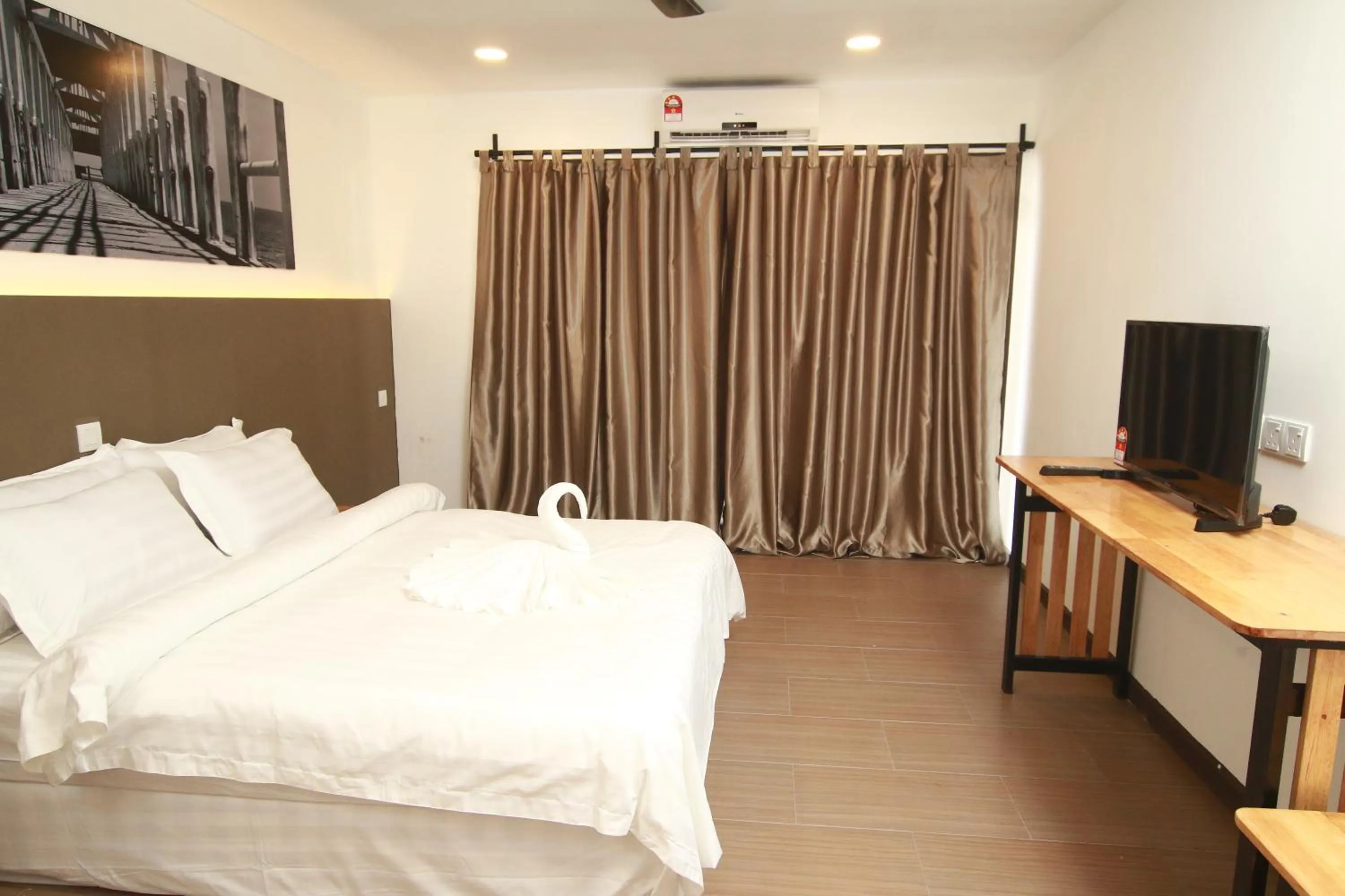 Bed in The Barat Tioman Beach Resort