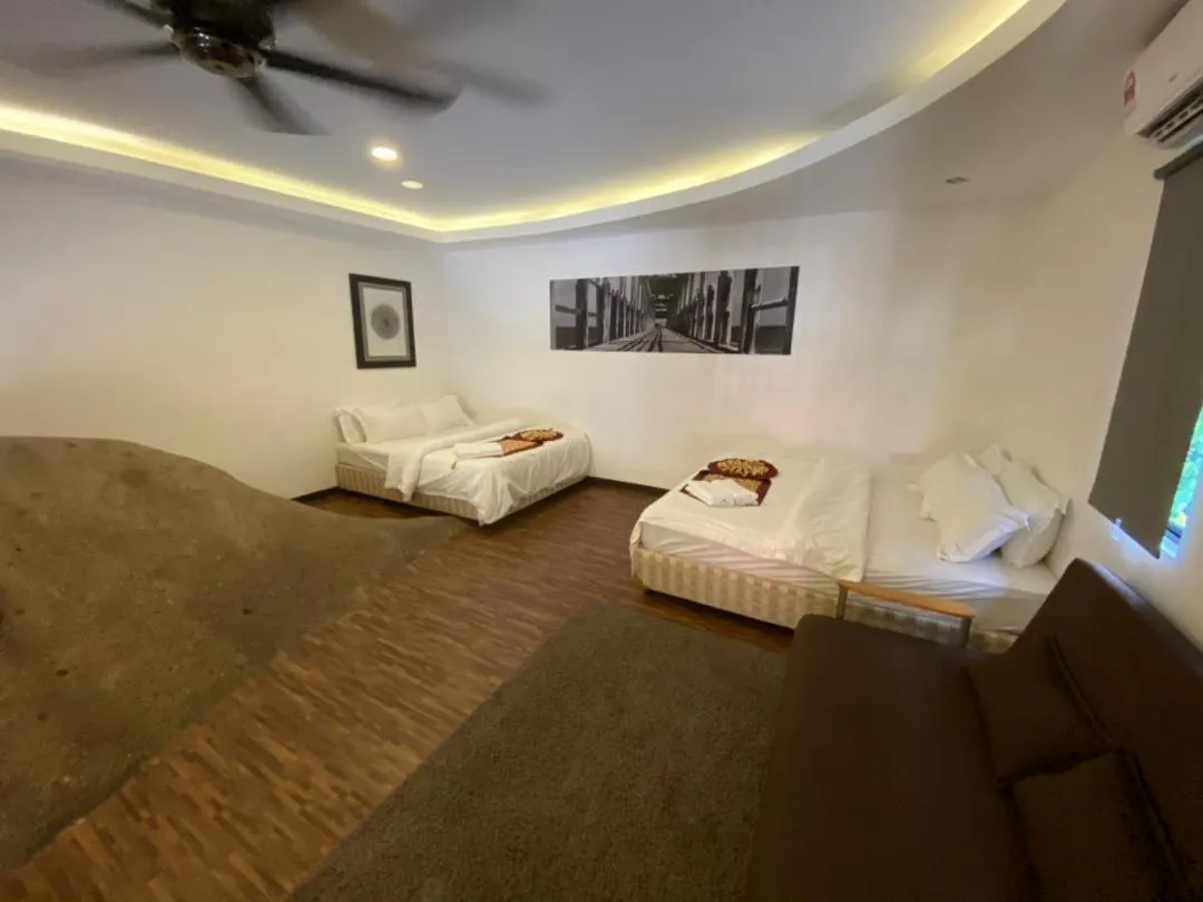 Bed in The Barat Tioman Beach Resort