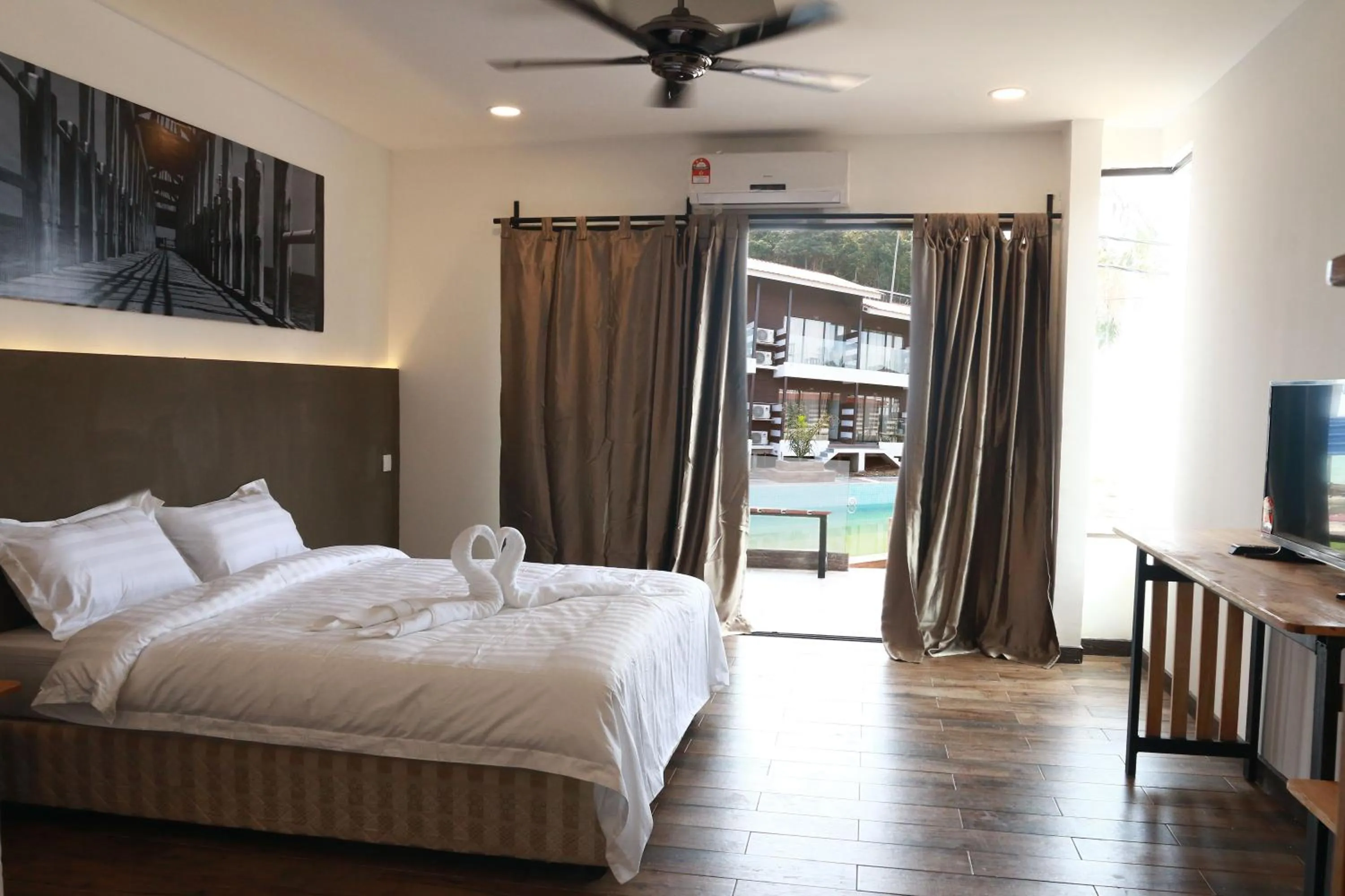 Photo of the whole room, Bed in The Barat Tioman Beach Resort