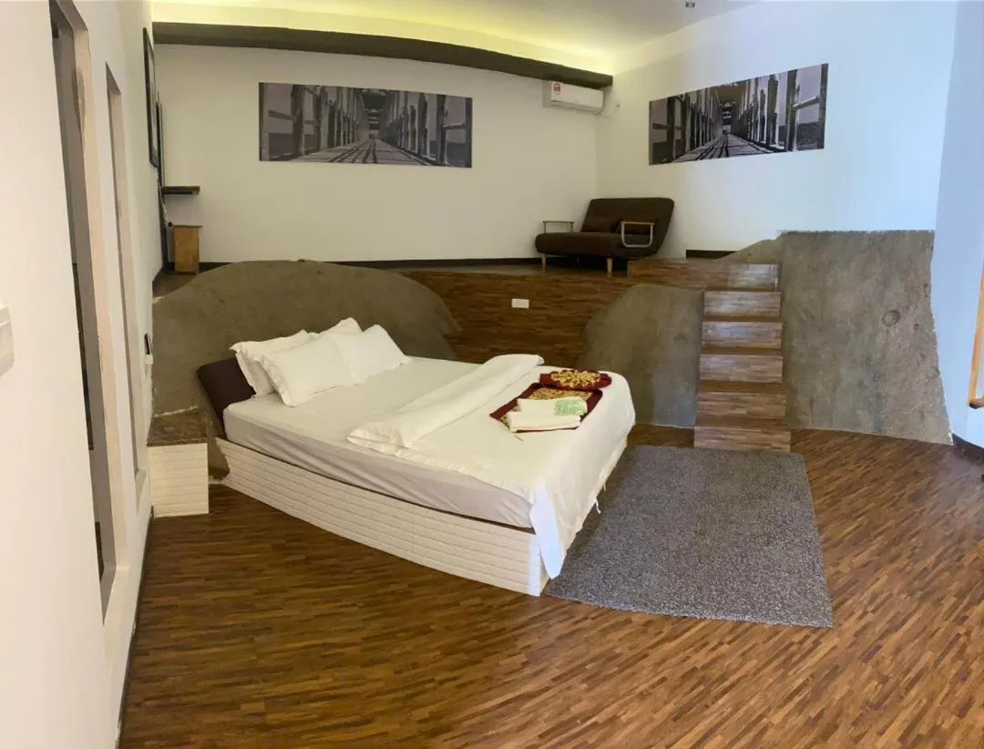 Bed in The Barat Tioman Beach Resort