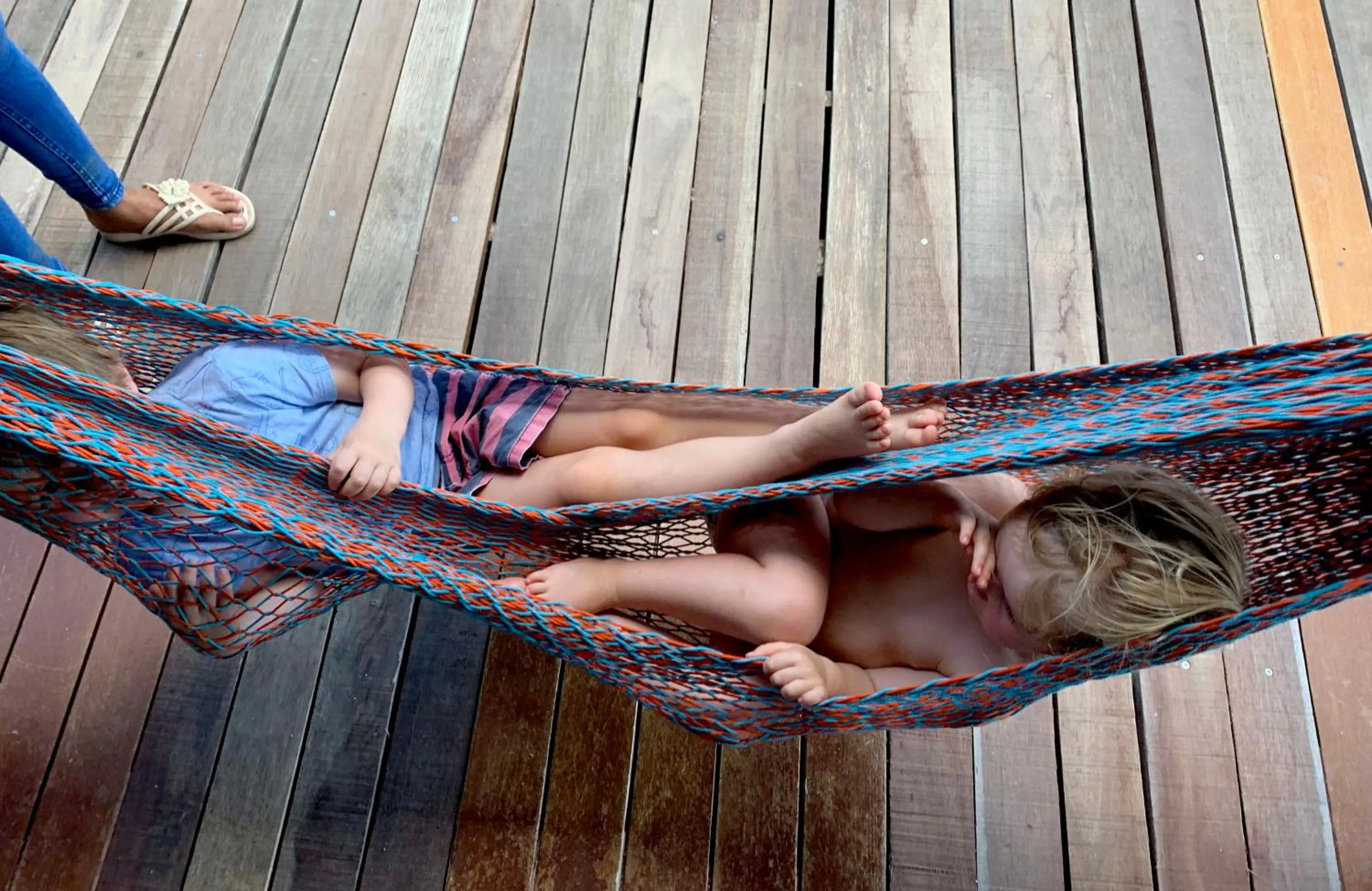 People in Sand in My Shoes Beach Loft