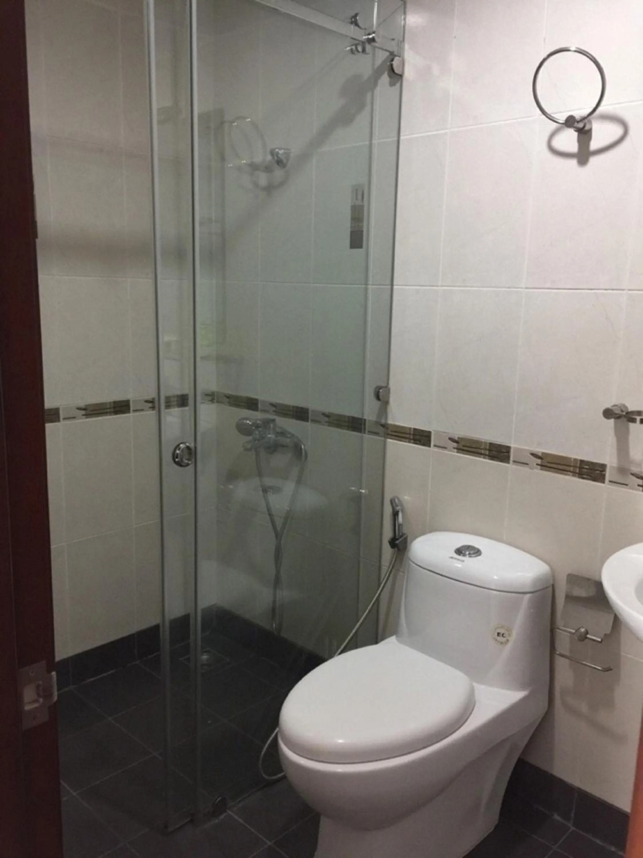 Shower in Chillax Apartment - Cozy 3-Bedroom City View Home at Tower, District 1
