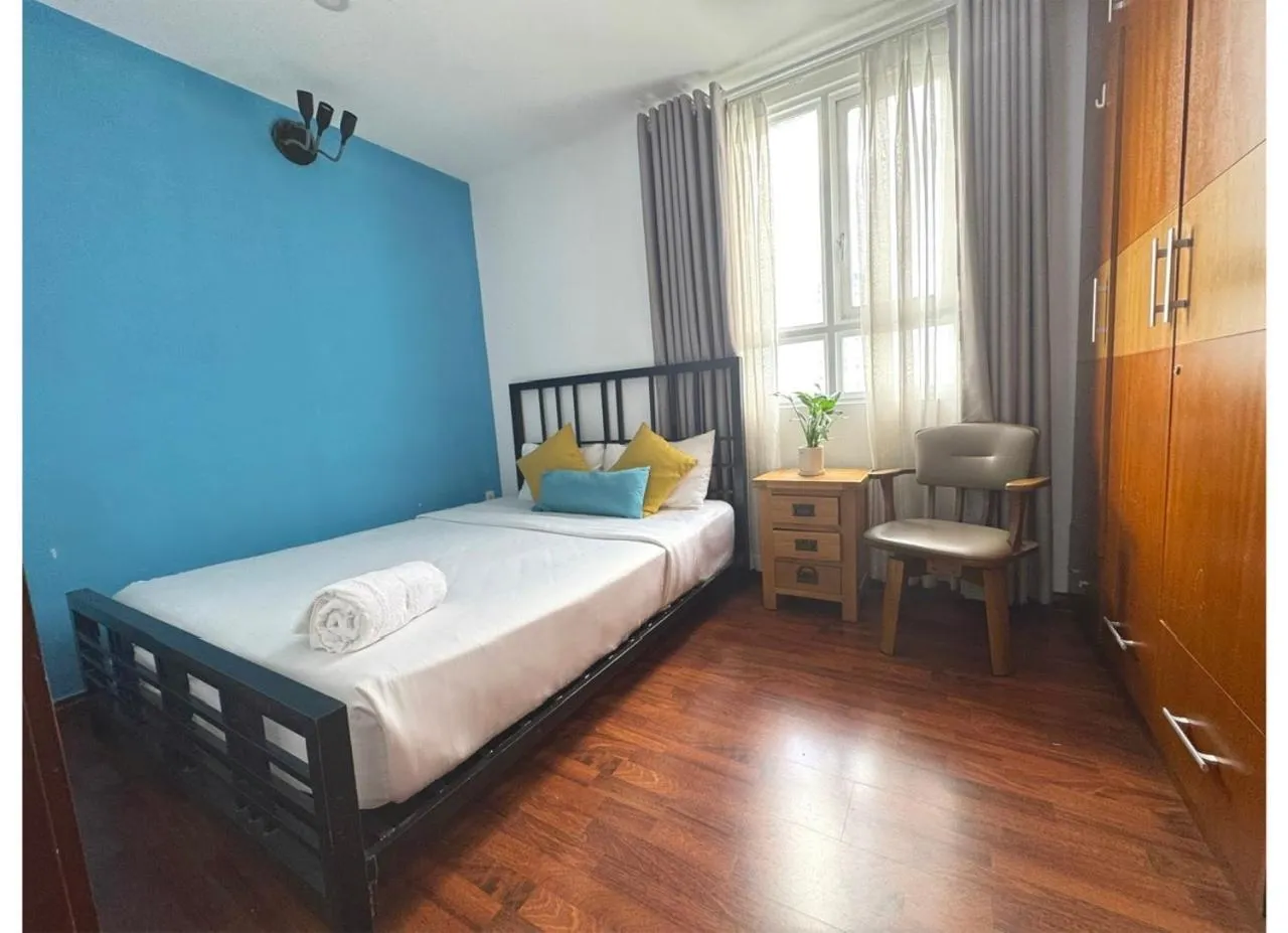 Bed in Chillax Apartment - Cozy 3-Bedroom City View Home at Tower, District 1