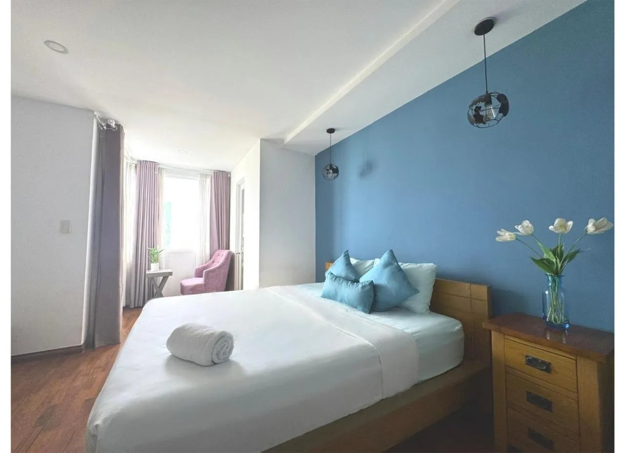 Bed in Chillax Apartment - Cozy 3-Bedroom City View Home at Tower, District 1