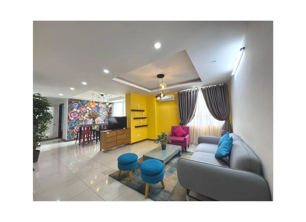 TV and multimedia in Chillax Apartment - Cozy 3-Bedroom City View Home at Tower, District 1