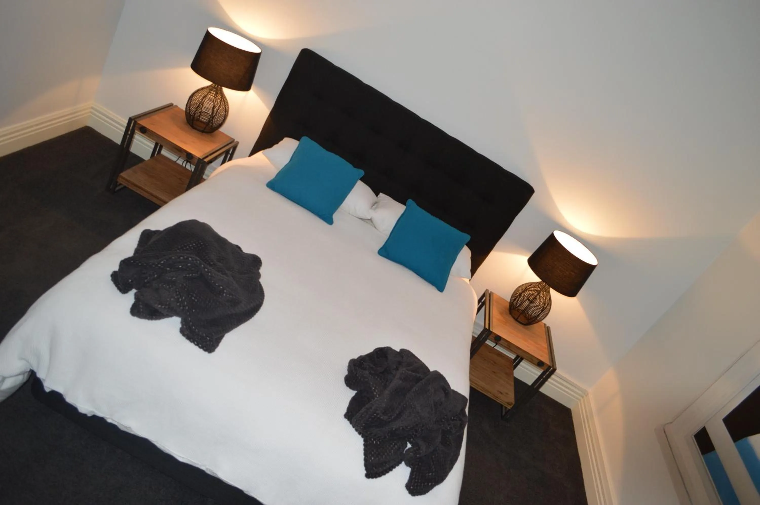 Bed in Two Cow Cottage Bed & Breakfast