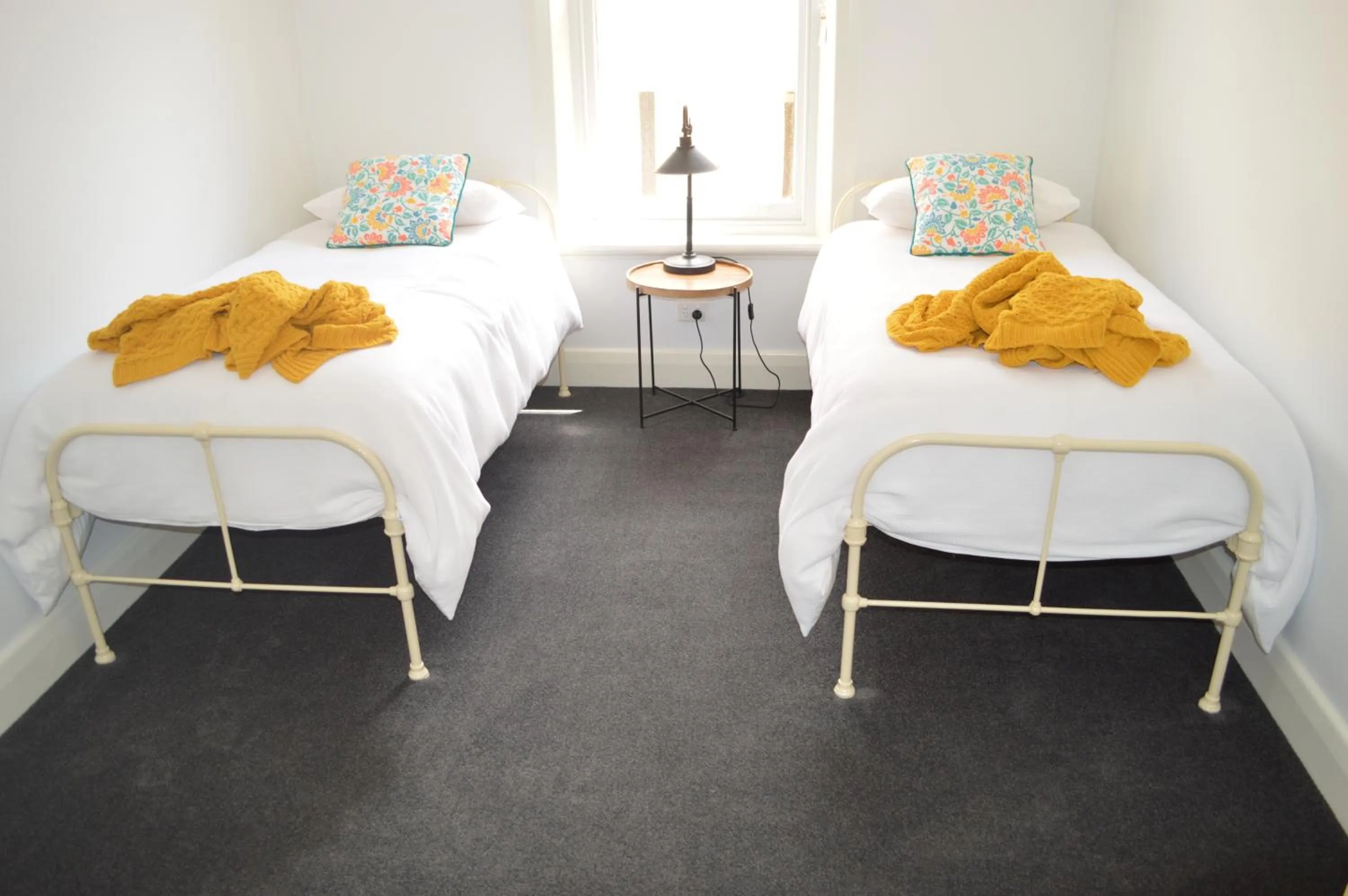 Bed in Two Cow Cottage Bed & Breakfast