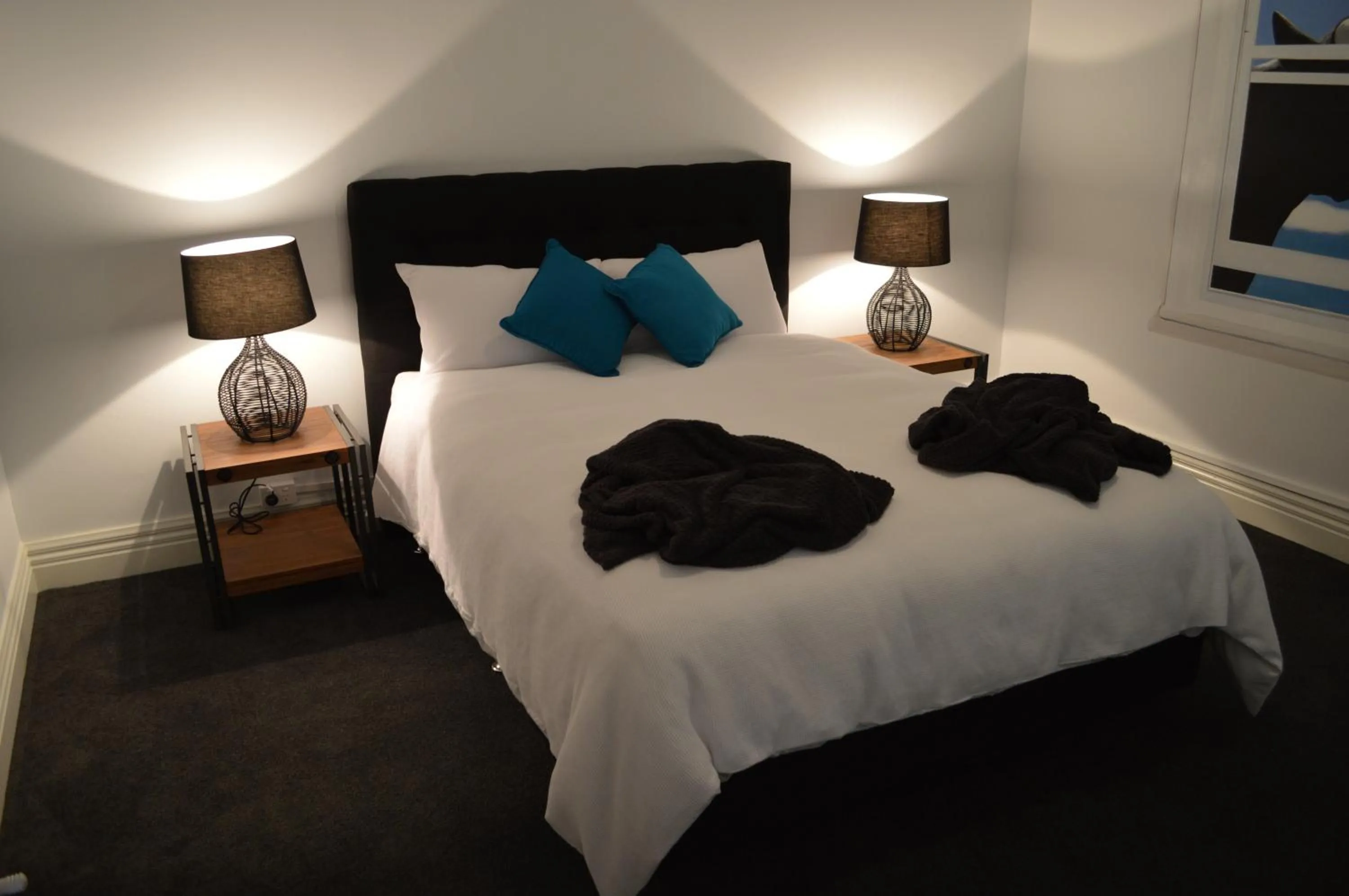 Bed in Two Cow Cottage Bed & Breakfast