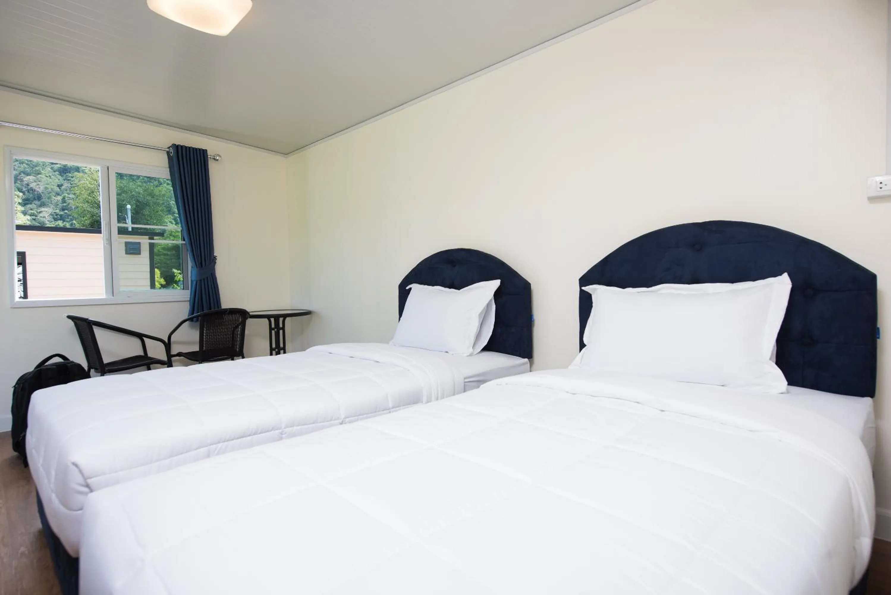 Bed in Tharapana Khaoyai Resort