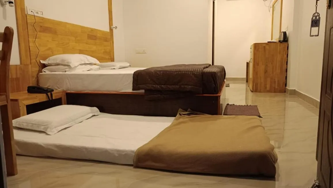 Bedroom, Bed in Coconhuts Beach Resort